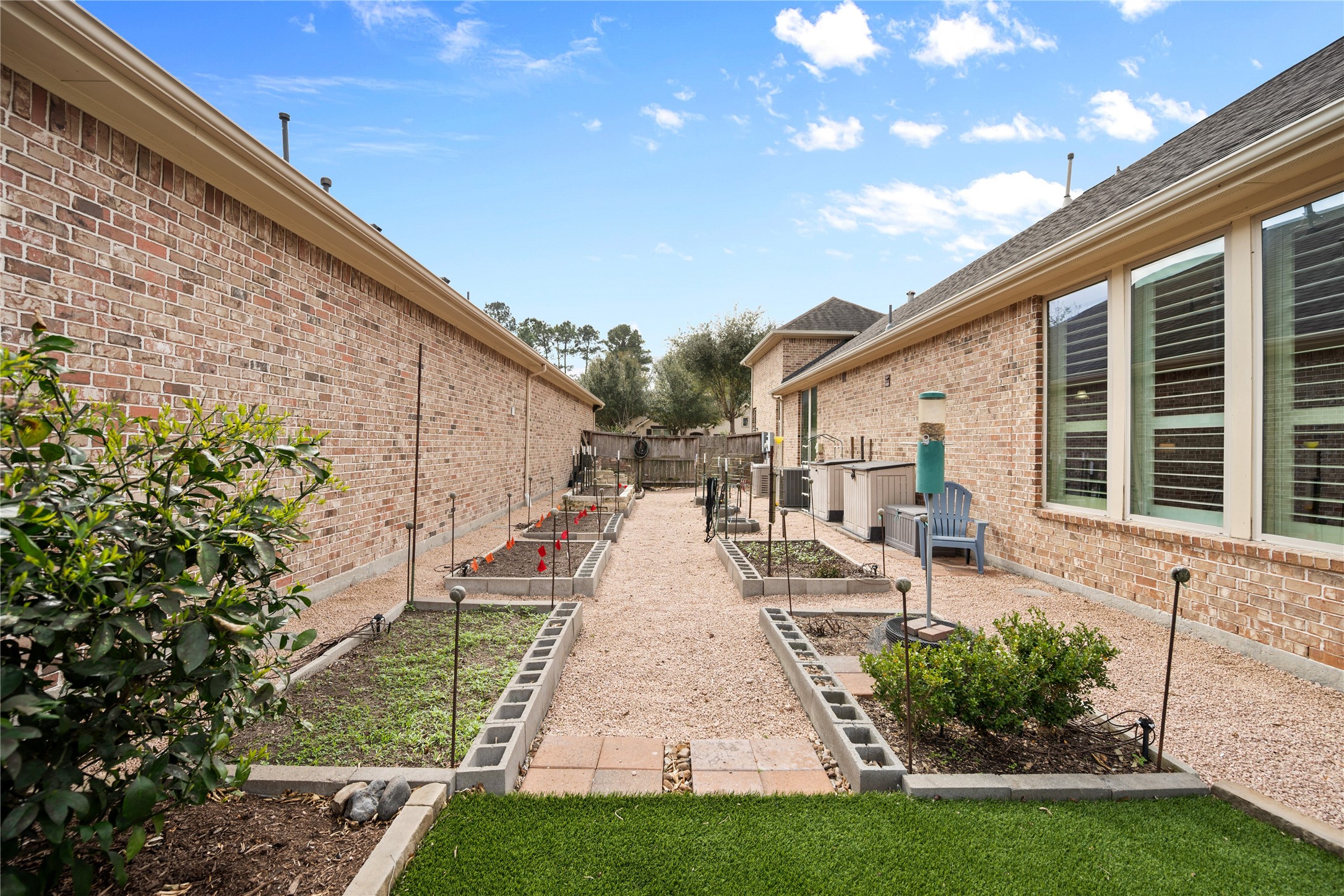 19911 Cullen Ridge Drive Porter, TX 77365 - Photo 36 of 42 a view of house with backyard and sitting area