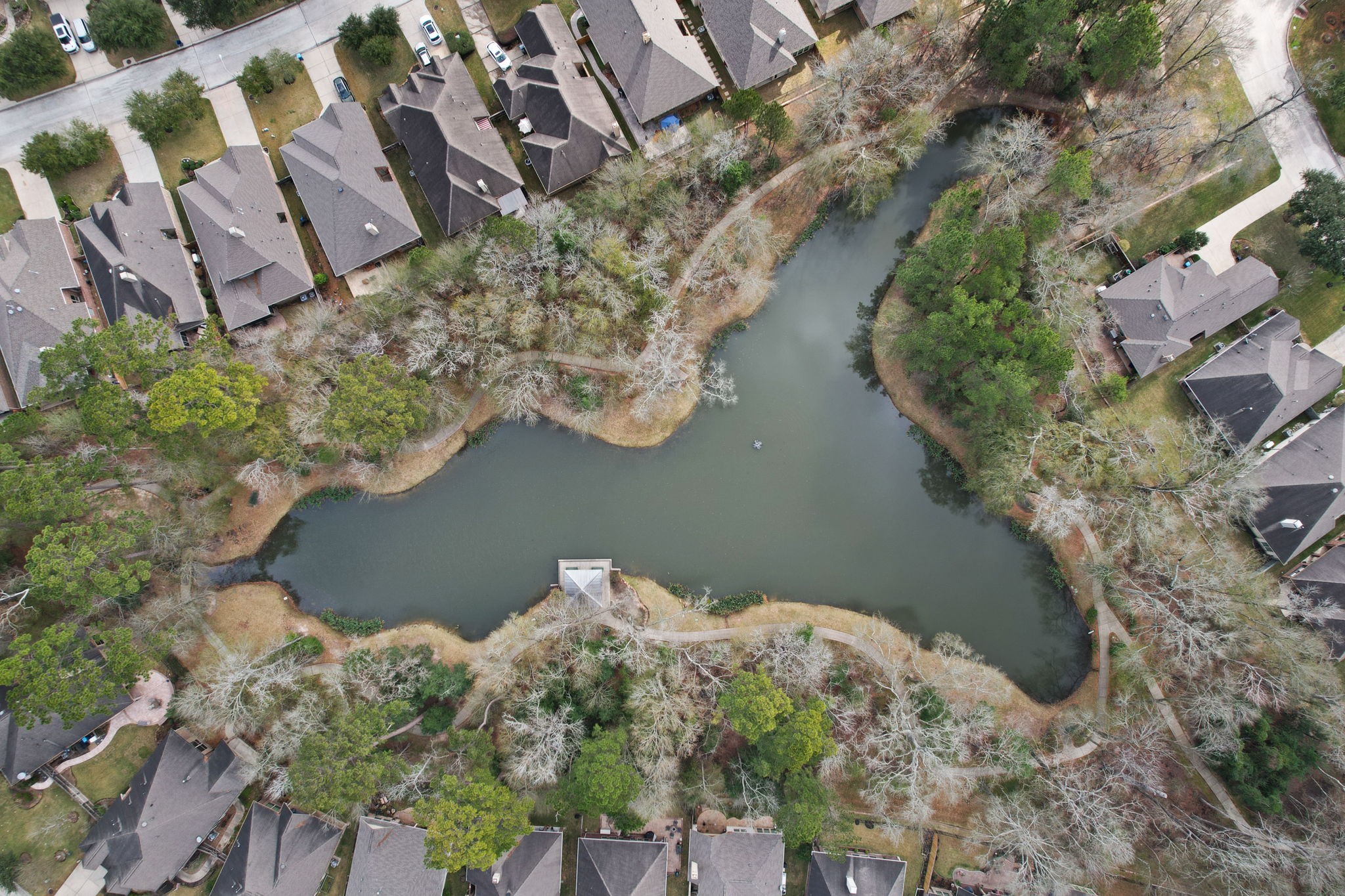 19911 Cullen Ridge Drive Porter, TX 77365 - Photo 41 of 42 an aerial view of a house with a yard and lake view