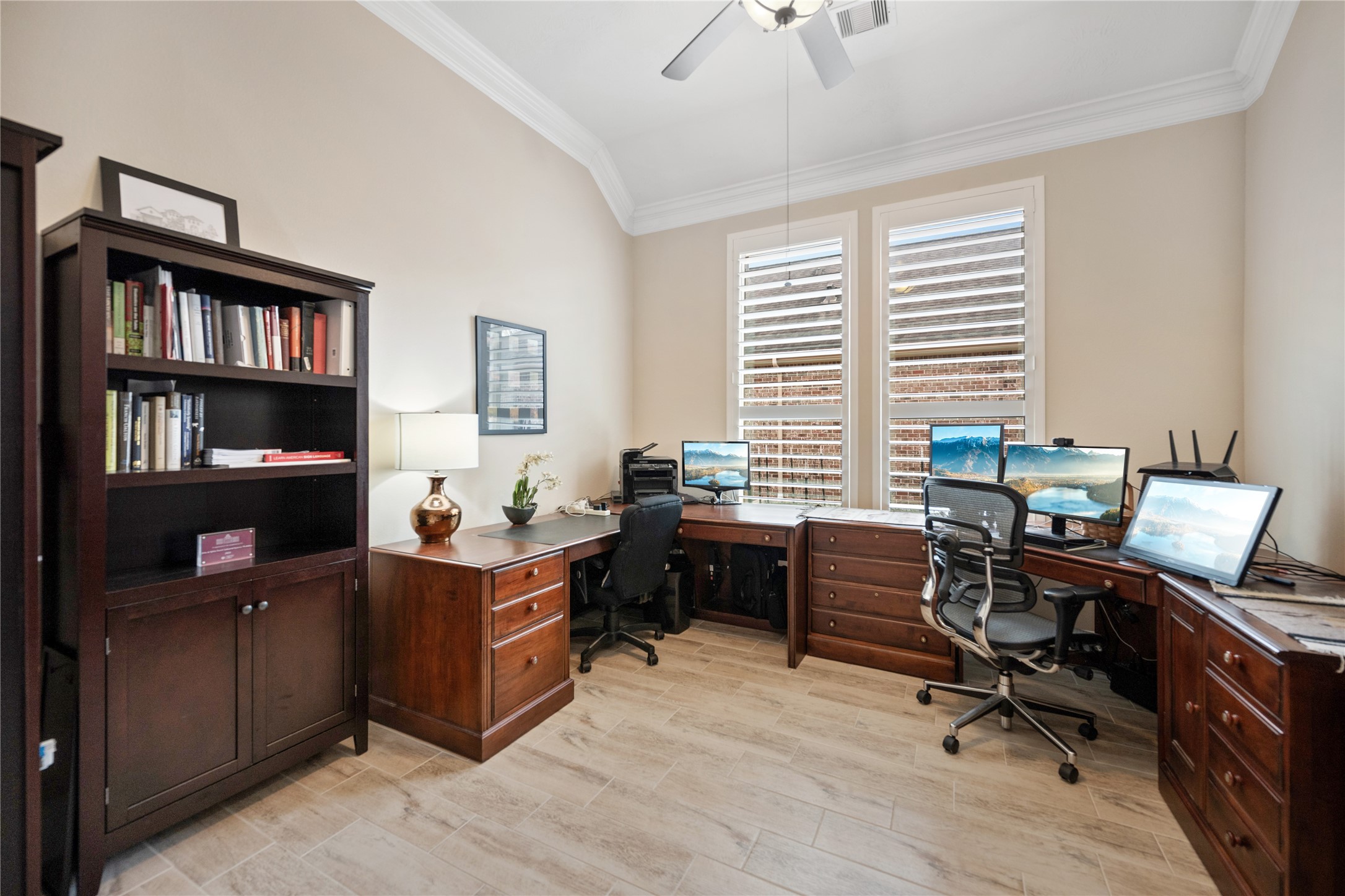 19911 Cullen Ridge Drive Porter, TX 77365 - Photo 5 of 42 This is a view of the Home office/Study off the foyer... Note the crown molding... Plantation Shutters... Ceiling fan...