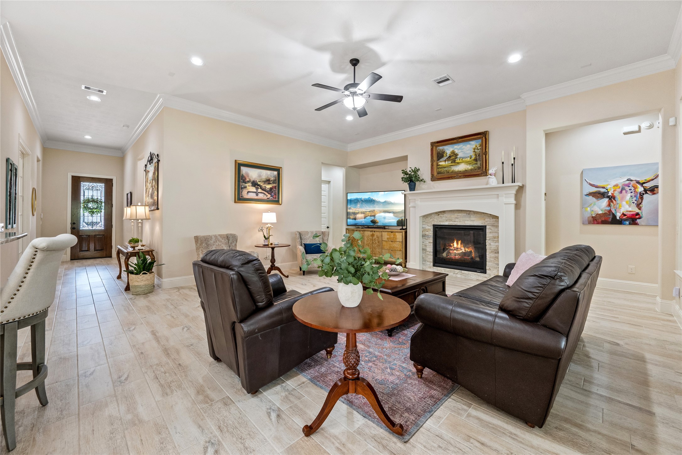 19911 Cullen Ridge Drive Porter, TX 77365 - Photo 9 of 42 a living room with furniture and a fireplace