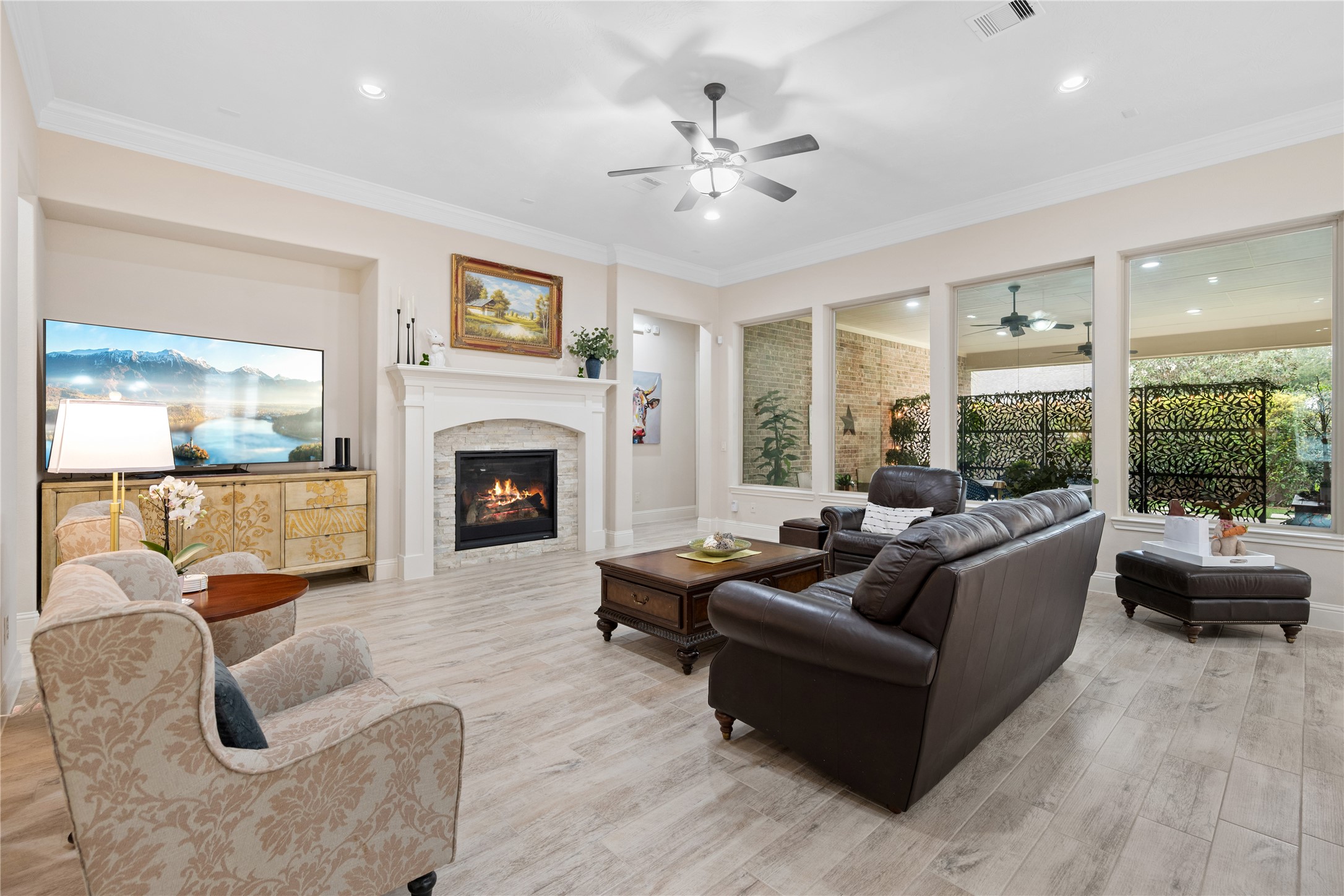 19911 Cullen Ridge Drive Porter, TX 77365 - Photo 10 of 42 a living room with furniture and a fireplace