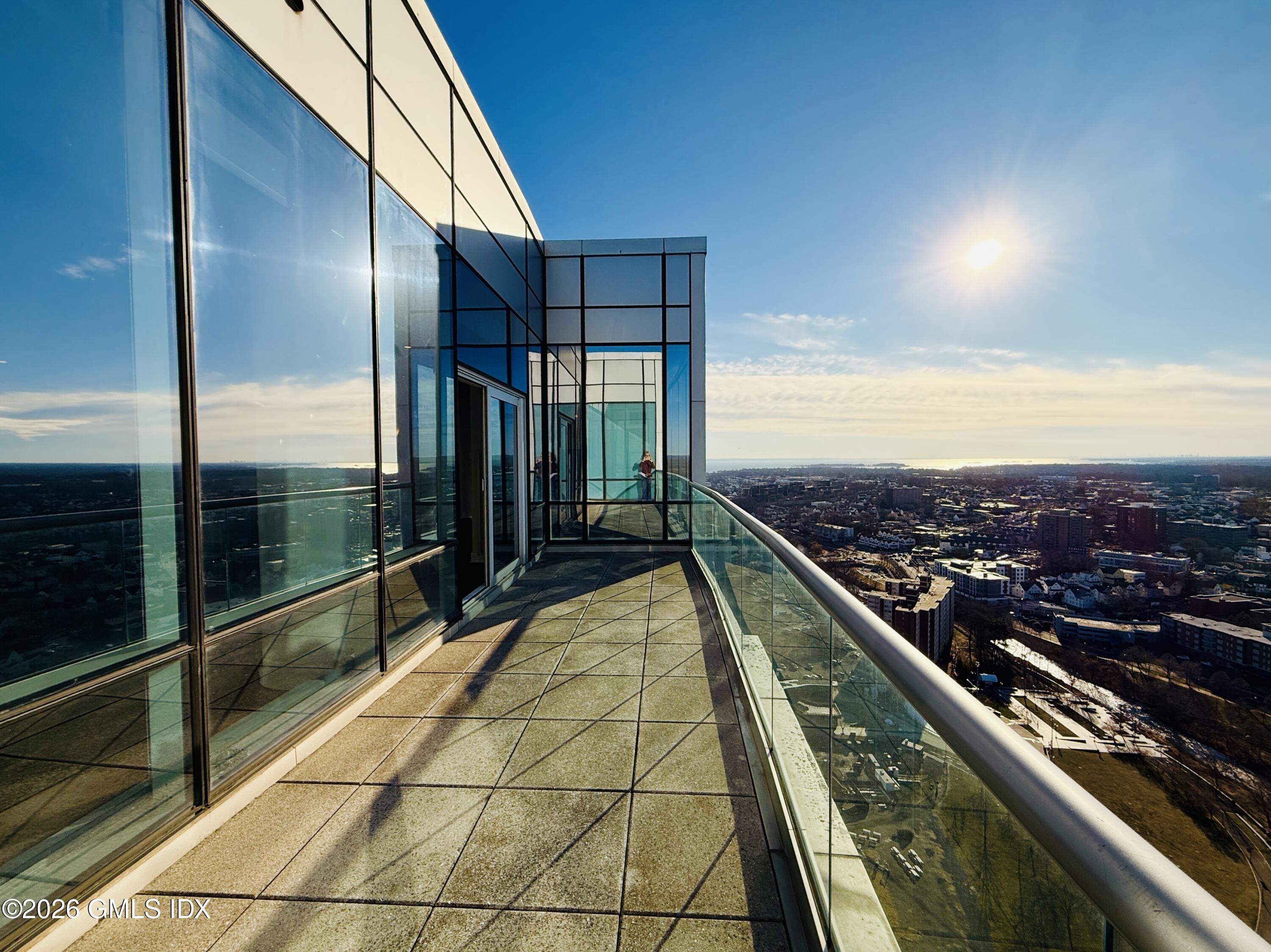 1 Broad Street, Unit PHD2 Stamford, CT 06901 - Photo 4 of 19 a view of balcony with an outdoor seating