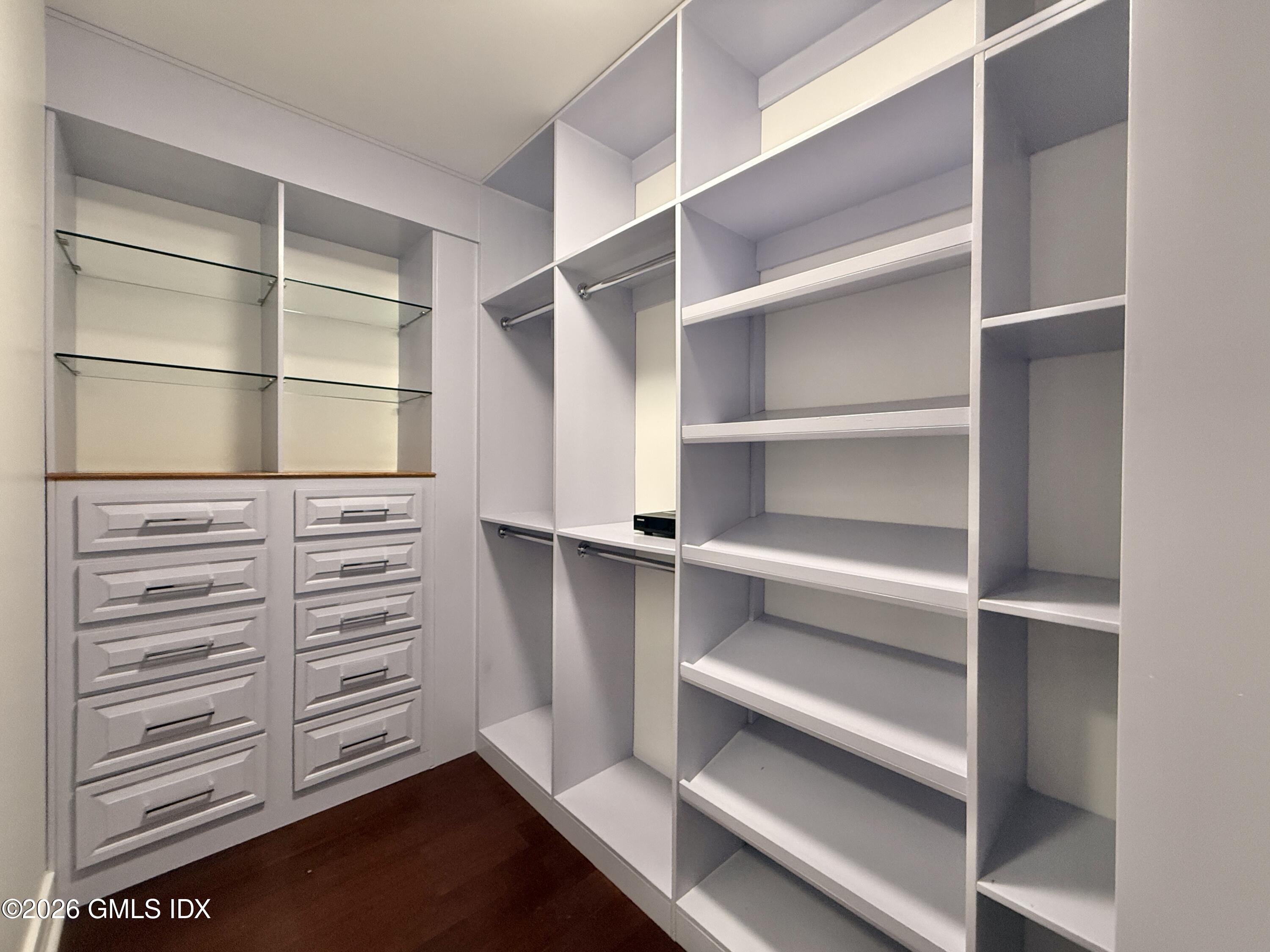 1 Broad Street, Unit PHD2 Stamford, CT 06901 - Photo 10 of 19 a view of walk in closet with empty racks