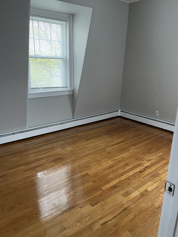 34 Herbert Street, Unit 6 Lynn, MA 01902 - Photo 5 of 9 a view of an empty room with a window