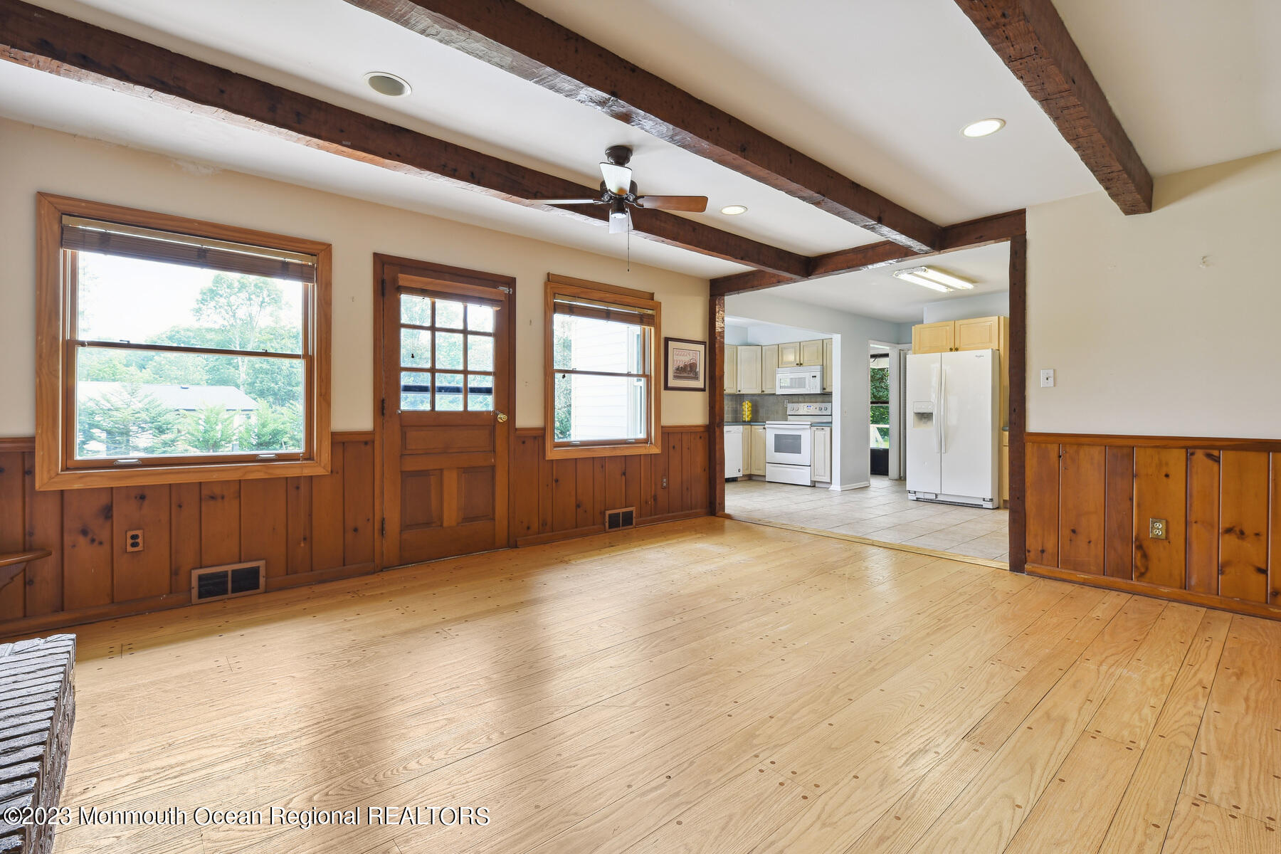 29 Willow Brook Road Holmdel, NJ 07733 - Photo 12 of 35 a view of an empty room with a window and wooden floor