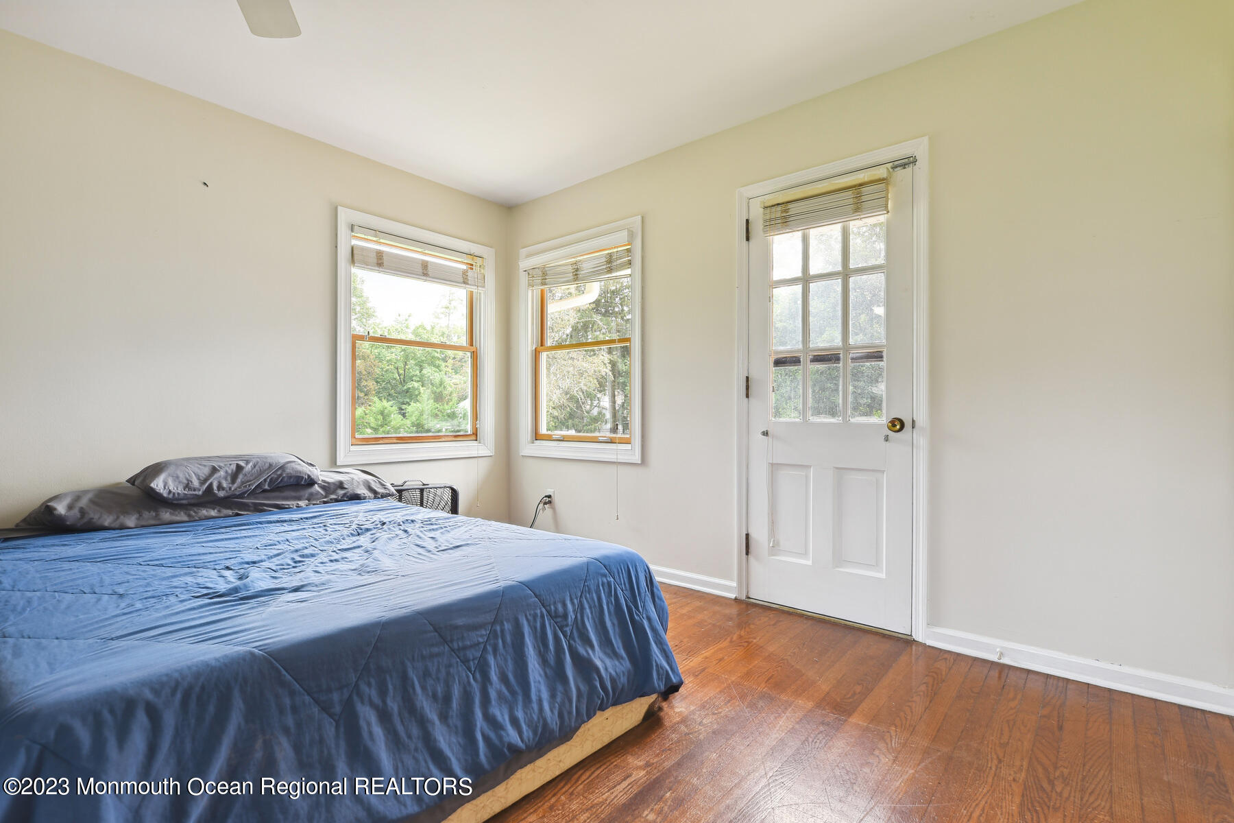 29 Willow Brook Road Holmdel, NJ 07733 - Photo 18 of 35 a bedroom with a bed and a window