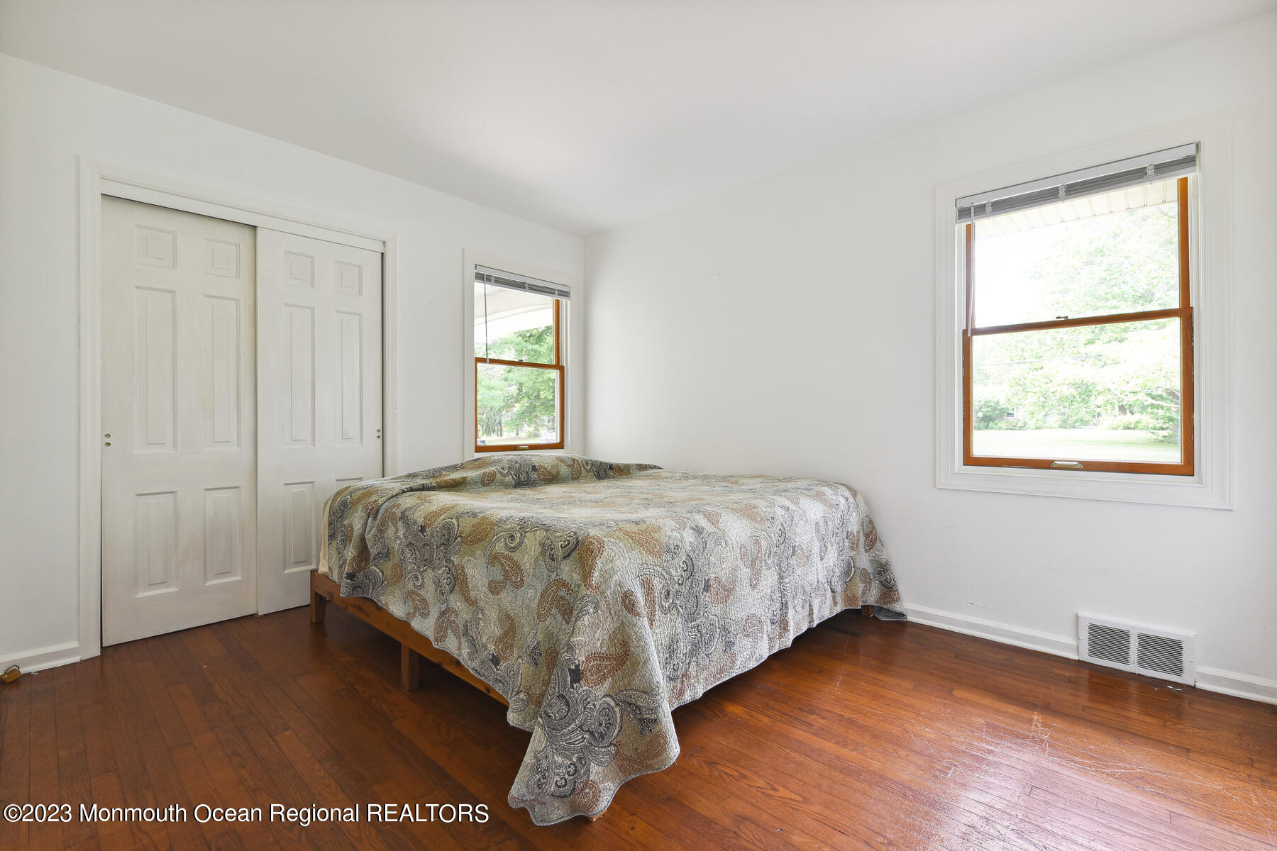 29 Willow Brook Road Holmdel, NJ 07733 - Photo 19 of 35 a bed sitting in a bedroom next to a window