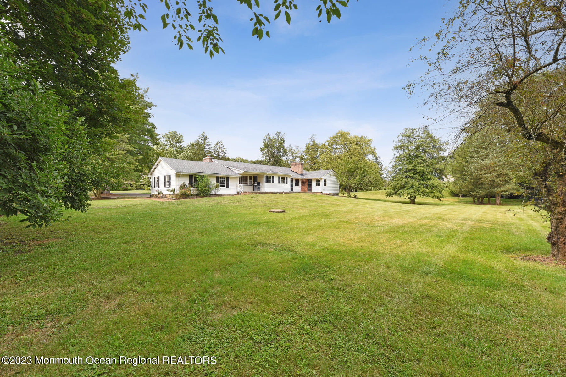 29 Willow Brook Road Holmdel, NJ 07733 - Photo 25 of 35 a view of yard with swimming pool and green space