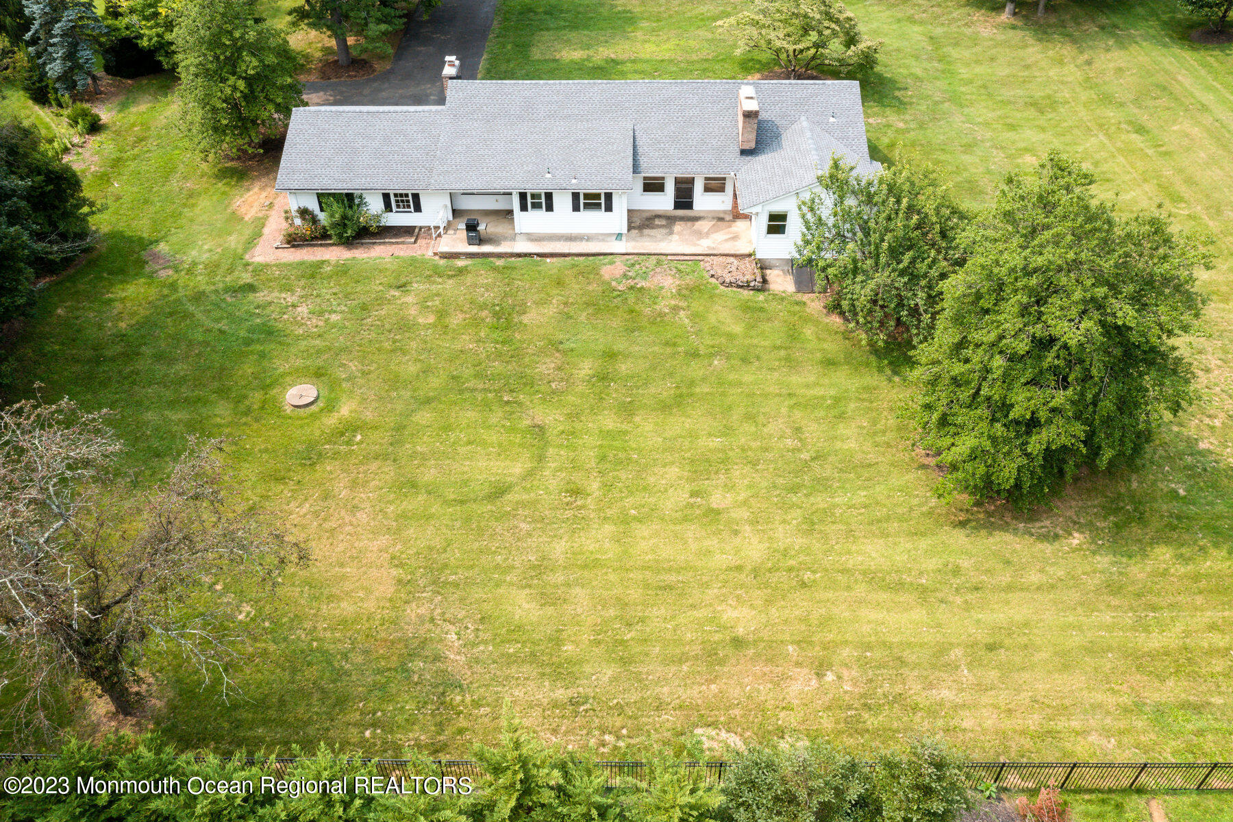 29 Willow Brook Road Holmdel, NJ 07733 - Photo 30 of 35 an aerial view of residential houses with swimming pool