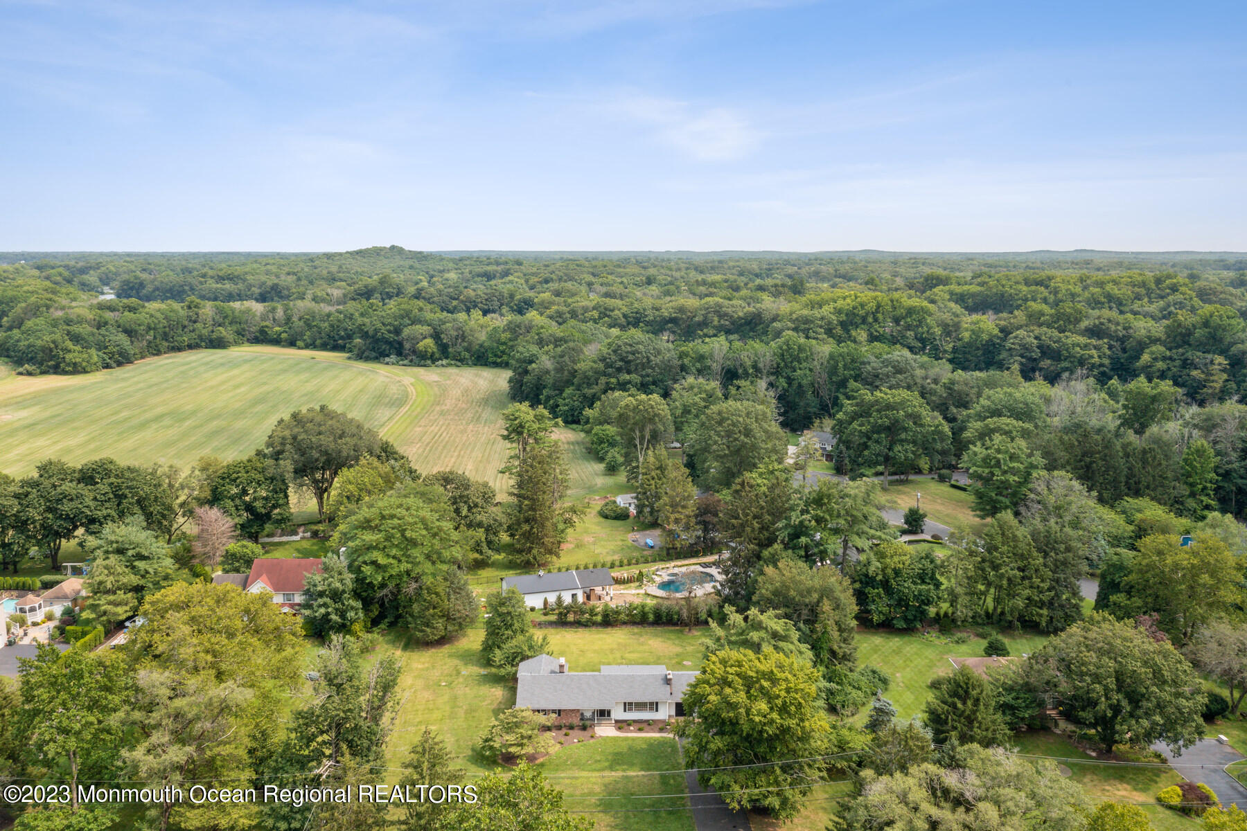 29 Willow Brook Road Holmdel, NJ 07733 - Photo 34 of 35 an aerial view of residential house with outdoor space and trees all around