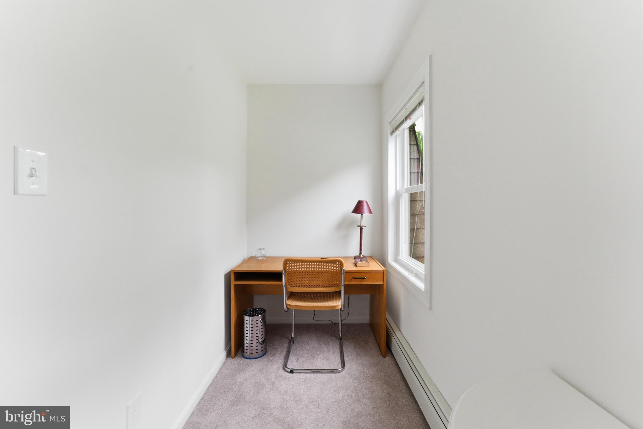 2100 Edgewater Parkway Silver Spring, MD 20903 - Photo 26 of 46 a room with a bed and a window