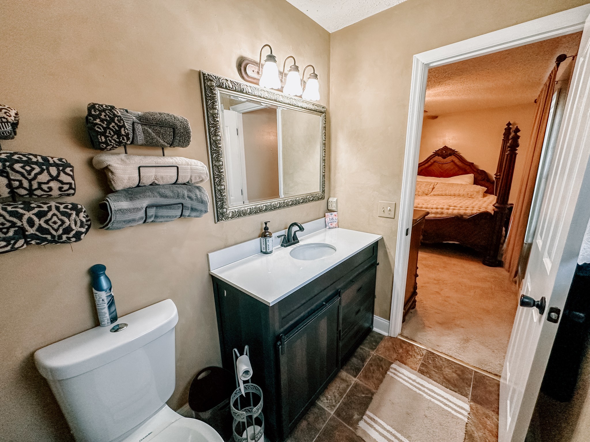 5124 East Calgary Murfreesboro, TN 37129 - Photo 12 of 32 a en suite bathroom with a toilet sink and mirror
