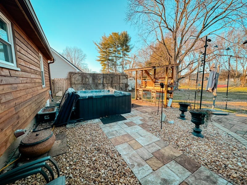 5124 East Calgary Murfreesboro, TN 37129 - Photo 24 of 32 a backyard of a house with barbeque oven table and chairs