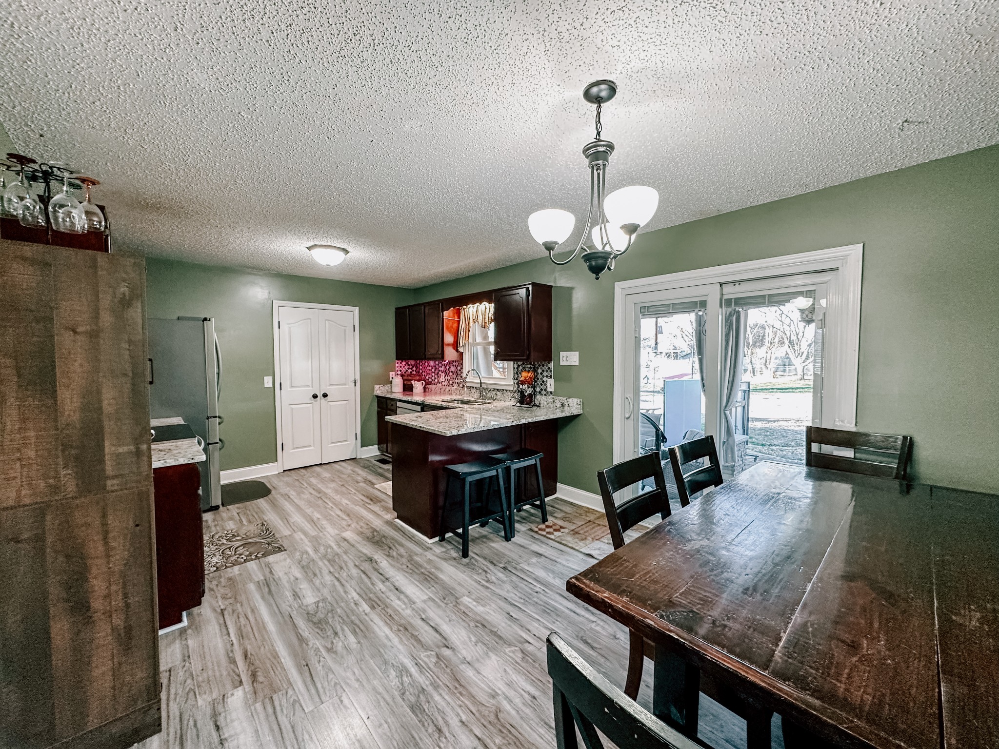 5124 East Calgary Murfreesboro, TN 37129 - Photo 4 of 32 a view of a dining room with furniture window and wooden floor