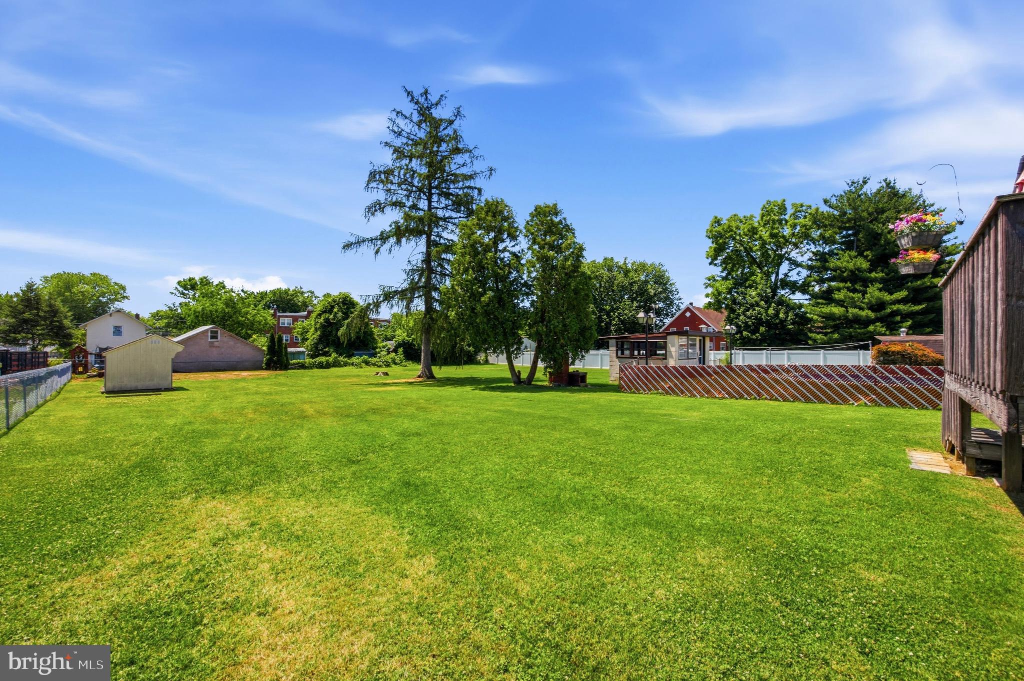 1004 Green Lane Secane, PA 19018 - Photo 32 of 49 a view of a garden with a tree in the background