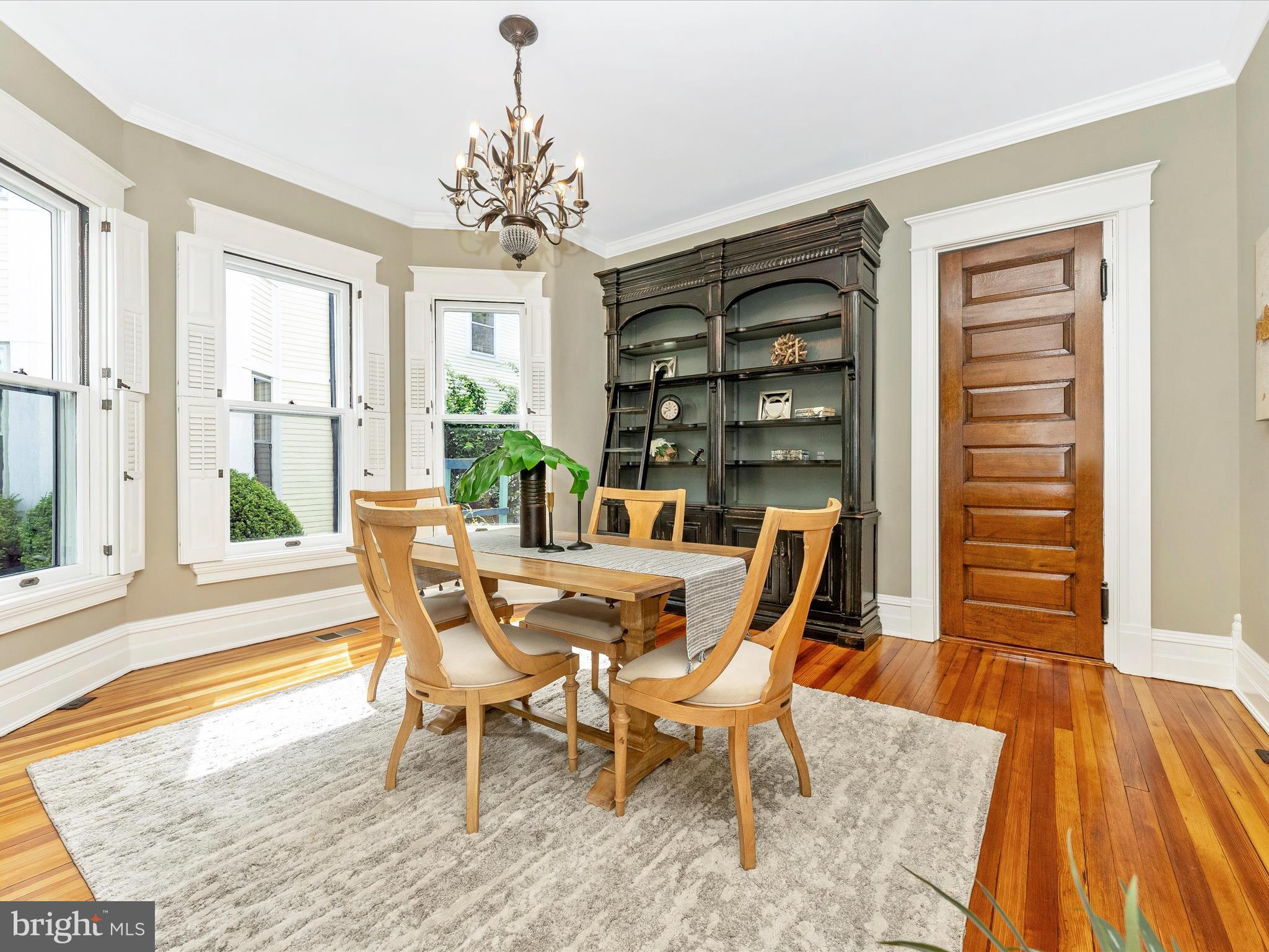 18 Clarke Place Frederick, MD 21701 - Photo 17 of 74 a dining room with furniture a rug and wooden floor