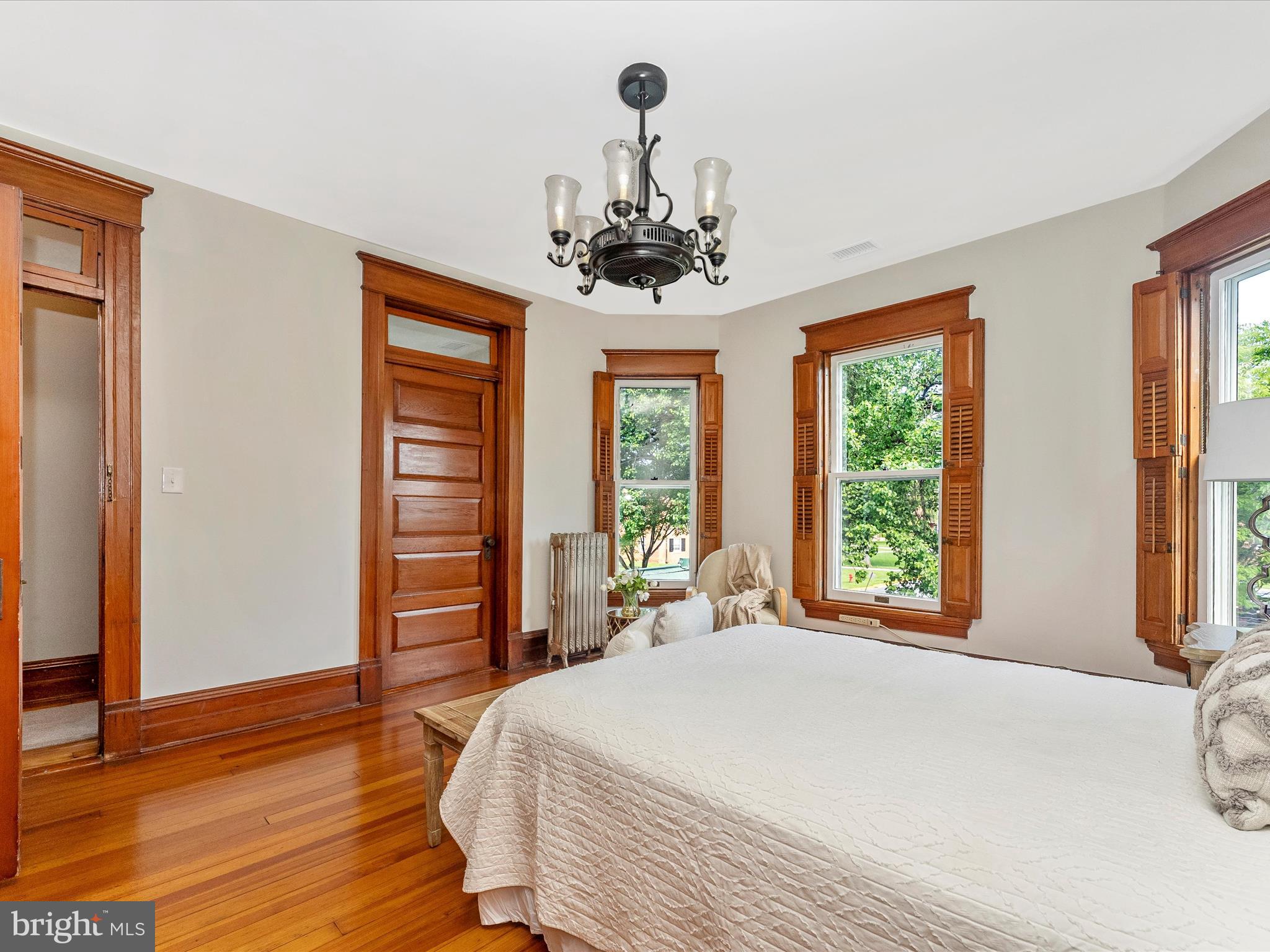 18 Clarke Place Frederick, MD 21701 - Photo 32 of 74 a bed room with a bed and a chandelier