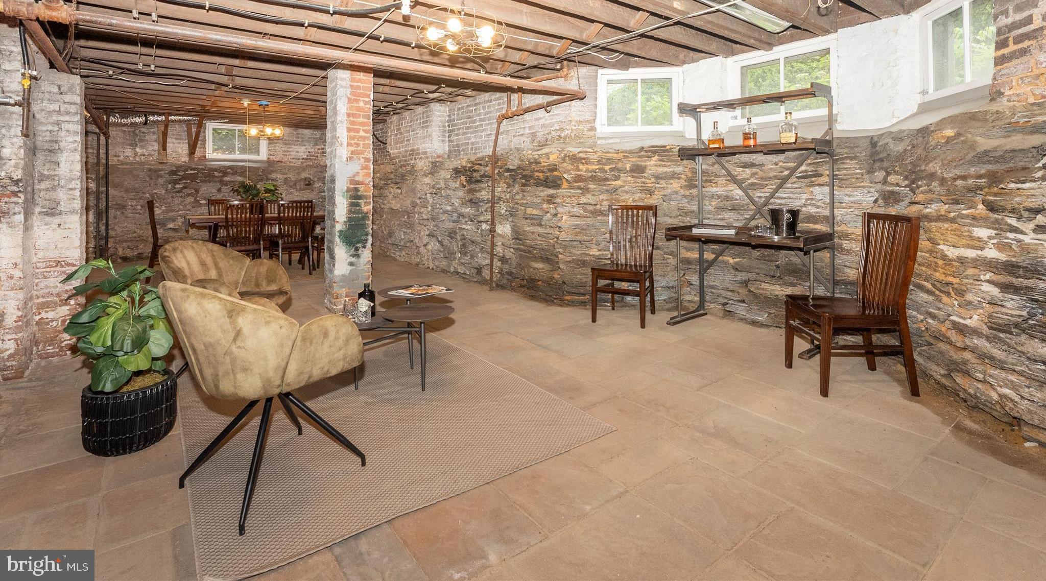 18 Clarke Place Frederick, MD 21701 - Photo 49 of 74 a view of a balcony with chairs and a potted plant