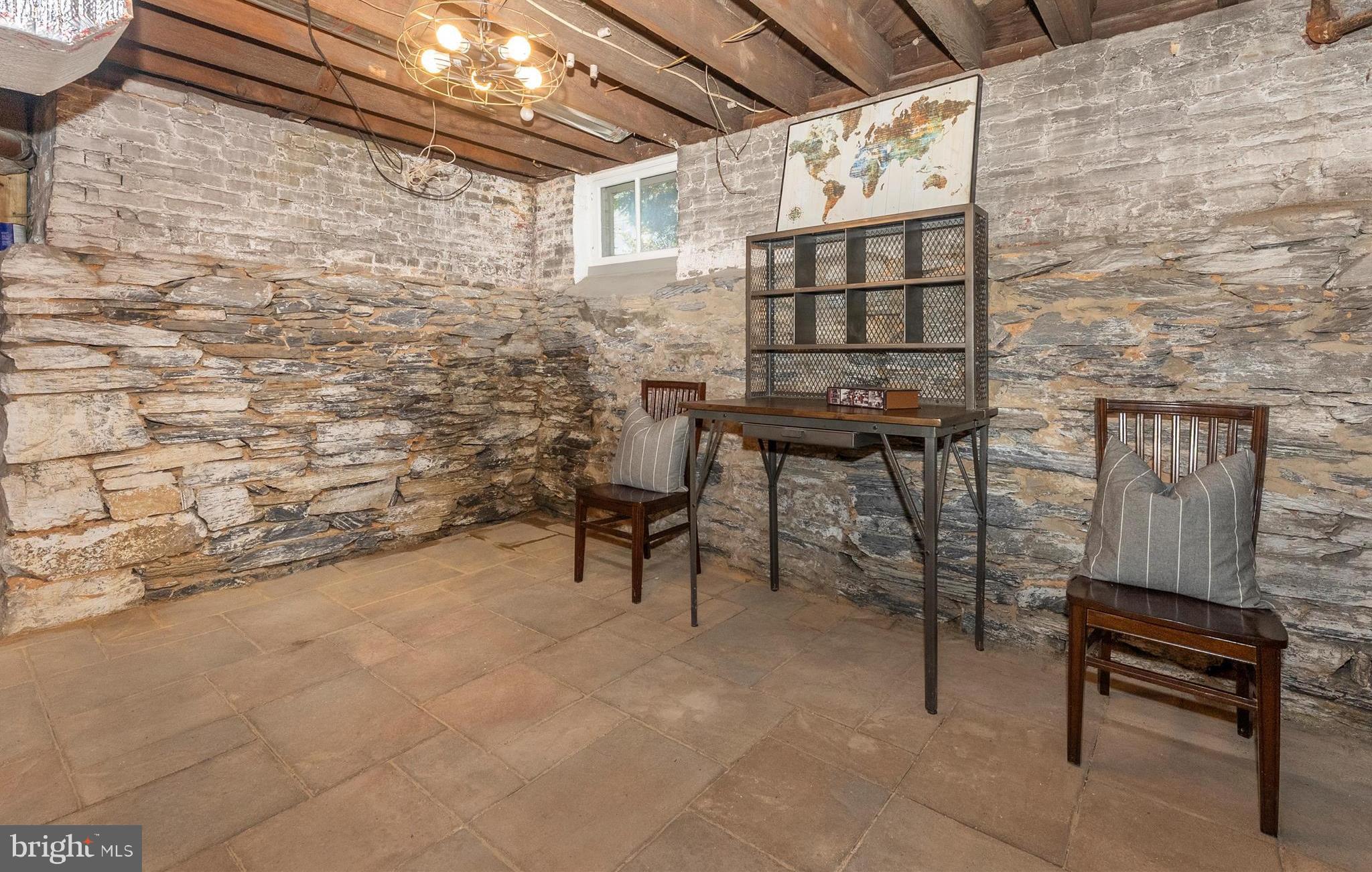 18 Clarke Place Frederick, MD 21701 - Photo 53 of 74 a view of a patio with table and chairs with wooden floor and fence