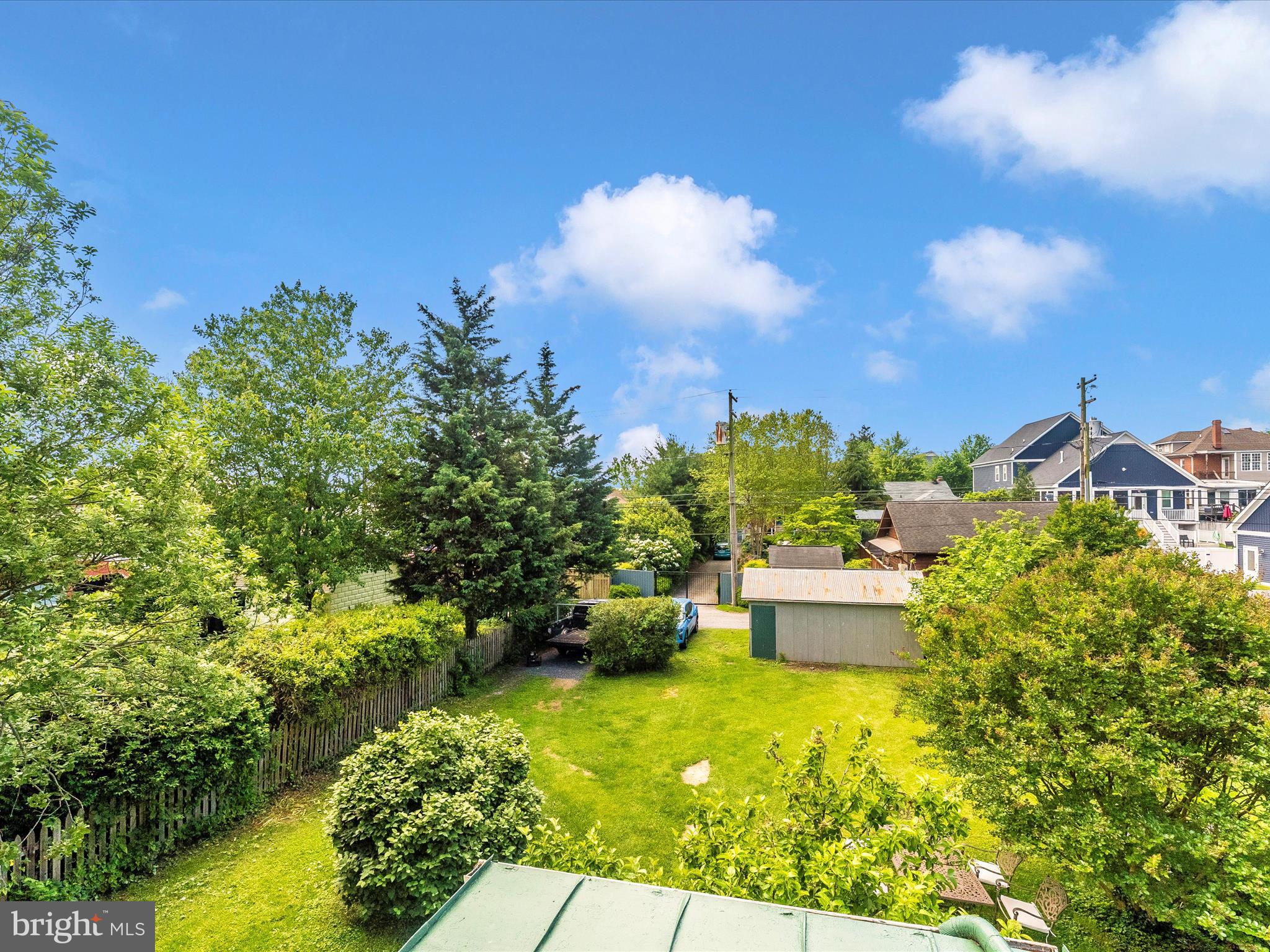 18 Clarke Place Frederick, MD 21701 - Photo 56 of 74 a view of a garden with a building in the background