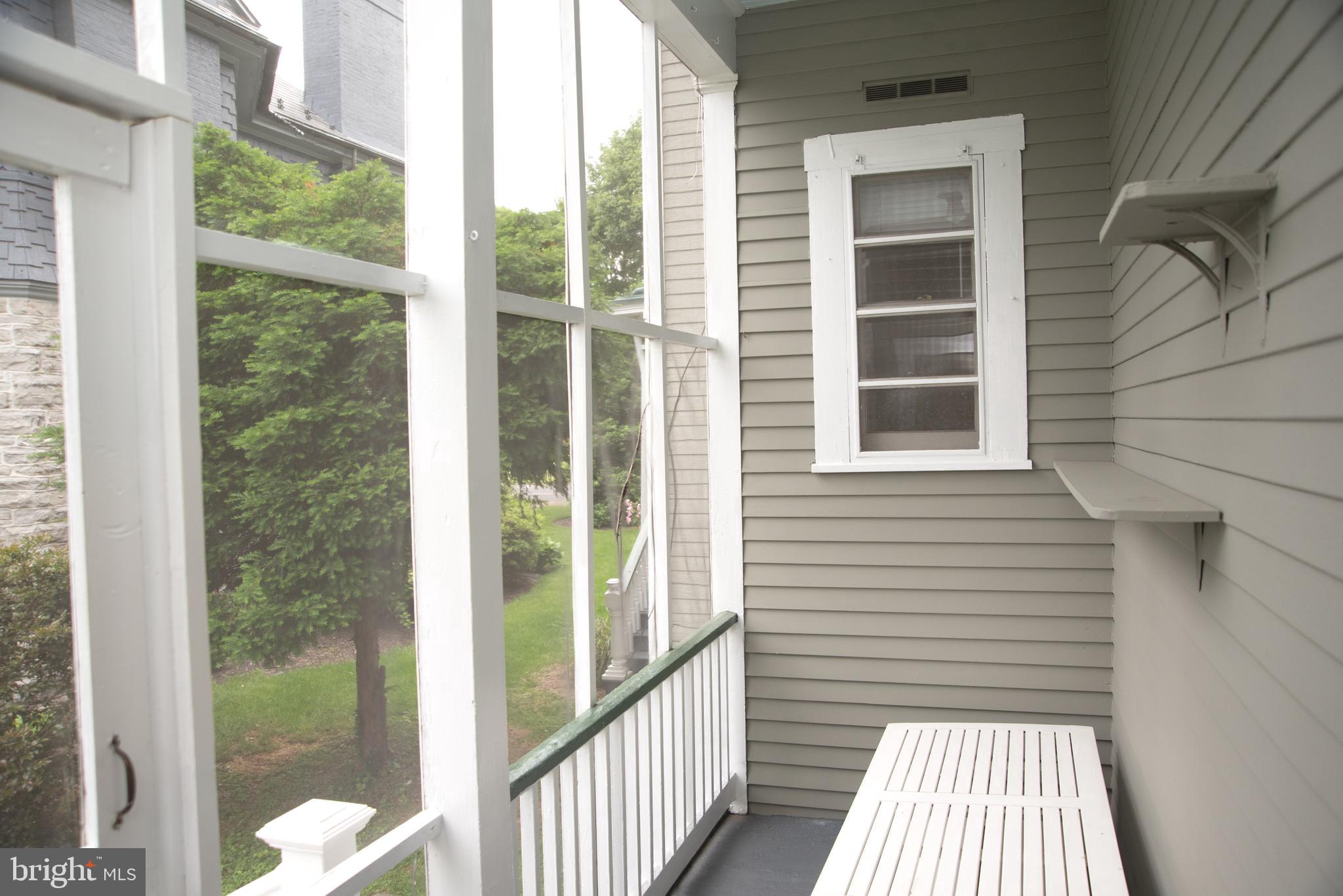 18 Clarke Place Frederick, MD 21701 - Photo 61 of 74 a view of a balcony with a floor to ceiling window