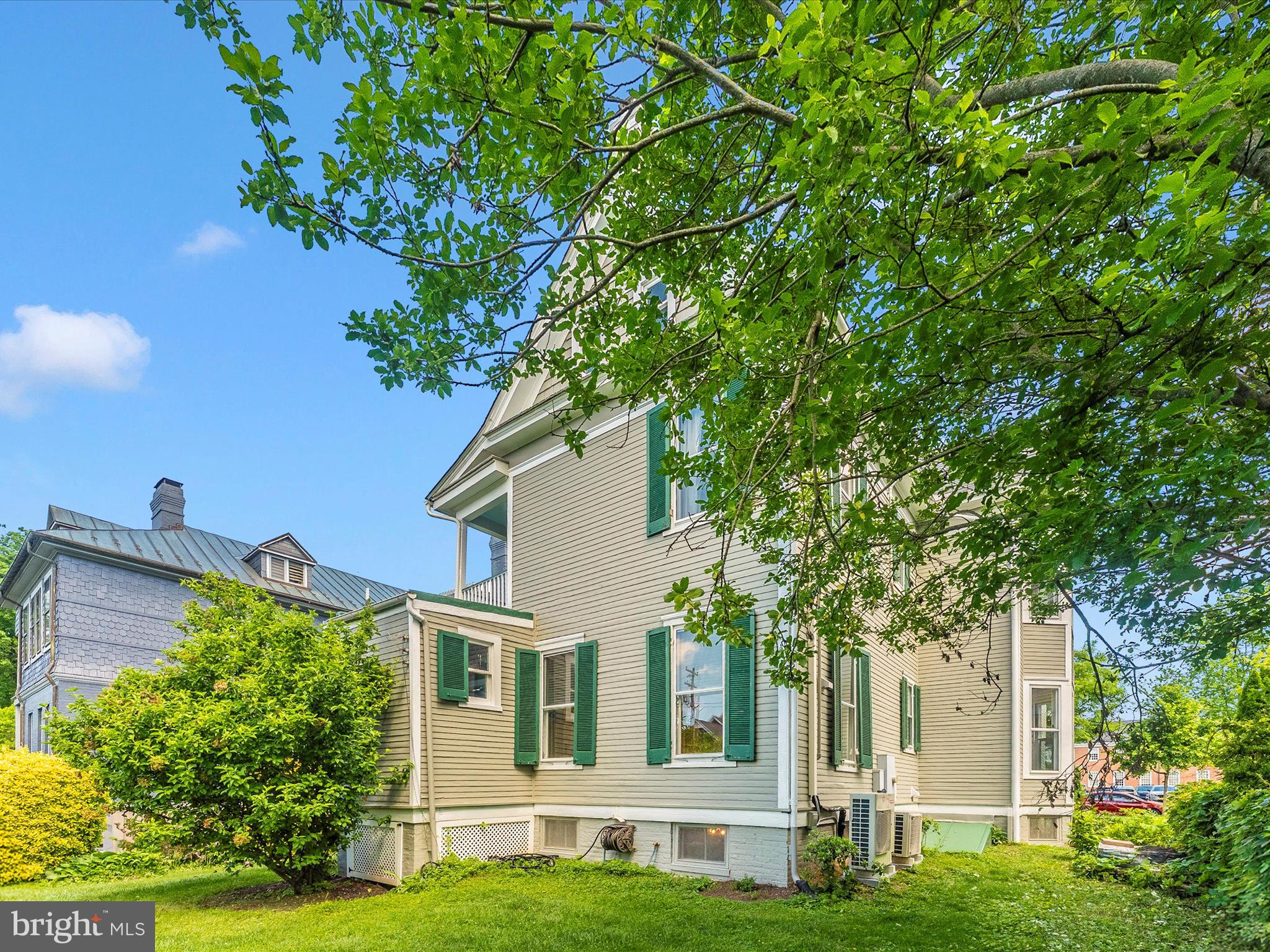 18 Clarke Place Frederick, MD 21701 - Photo 63 of 74 a front view of a house with a yard and trees