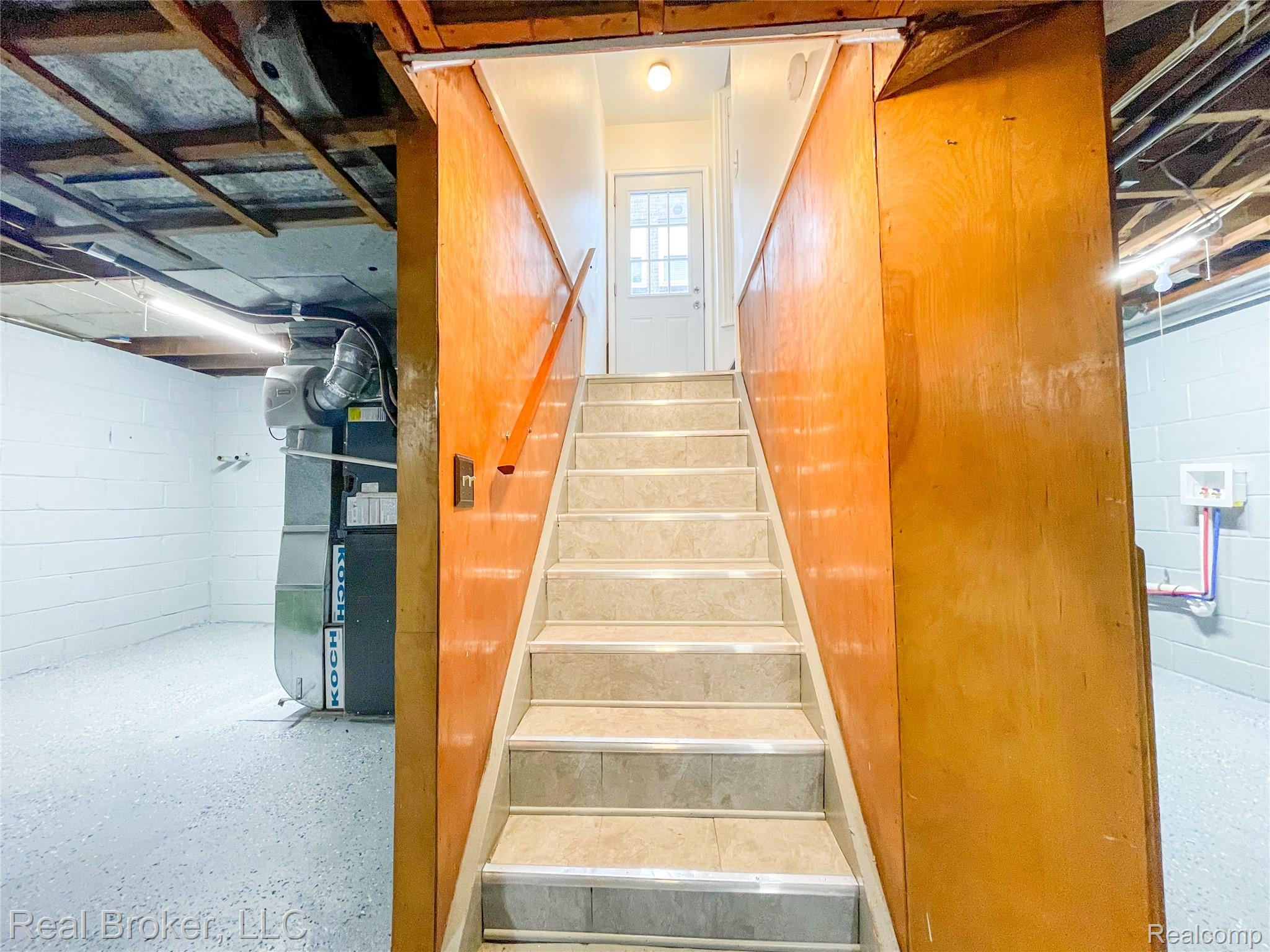603 Vernier Road Grosse Pointe, MI 48236 - Photo 18 of 33 Staircase featuring heating unit