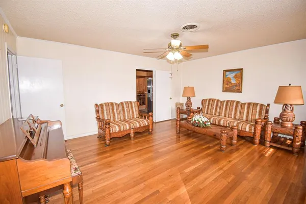 a view of a livingroom with furniture and a couch