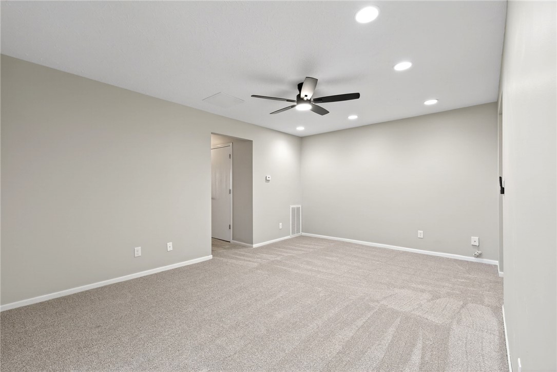 3151 Roesch Boulevard, Unit 6 Fairfield, OH 45014 - Photo 12 of 29 This spacious room offers comfort and versatility, featuring ample lighting and plush carpeting.