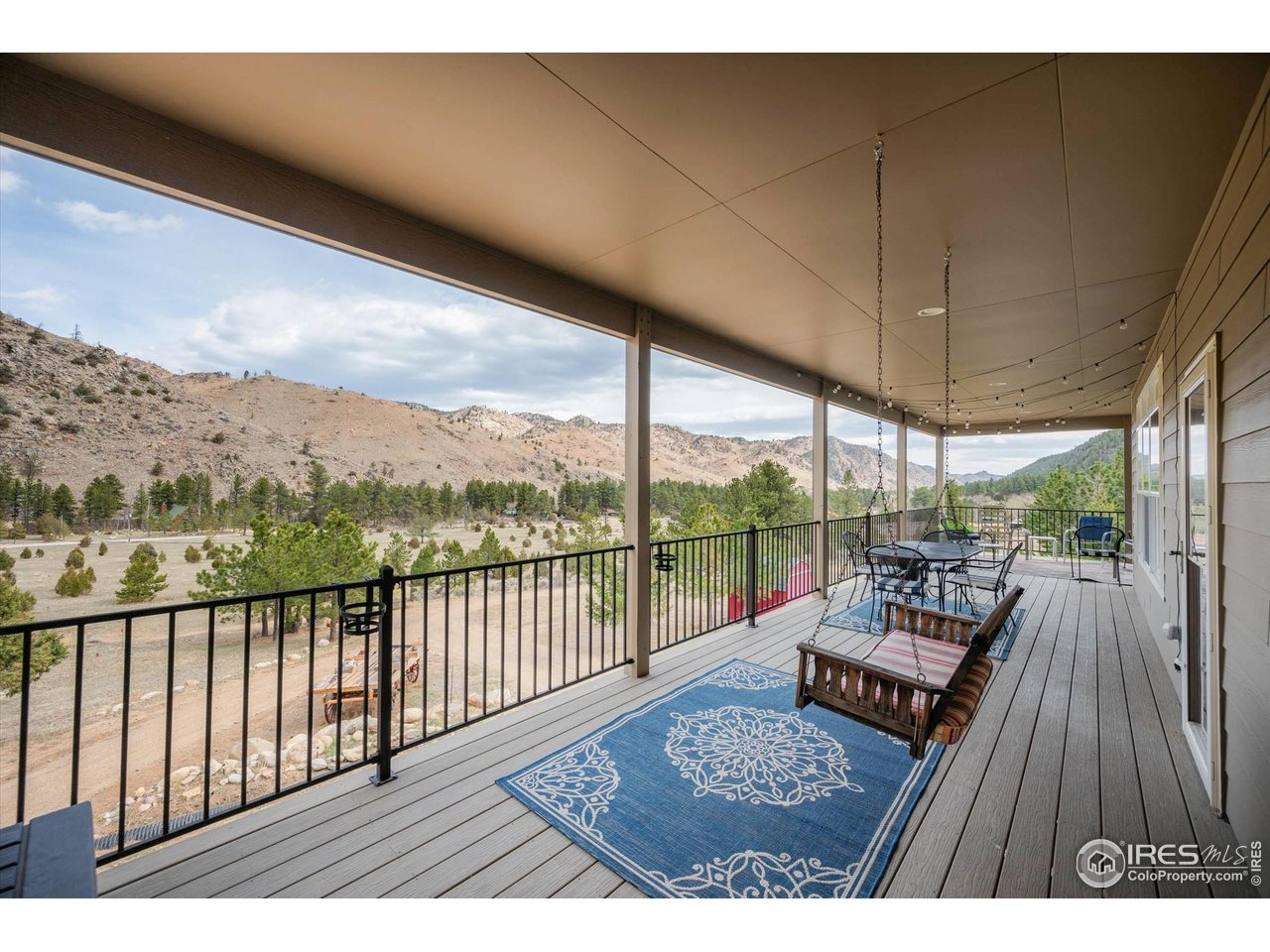 229 Rustic Road Bellvue, CO 80512 - Photo 11 of 50 a view of a couches on the roof deck