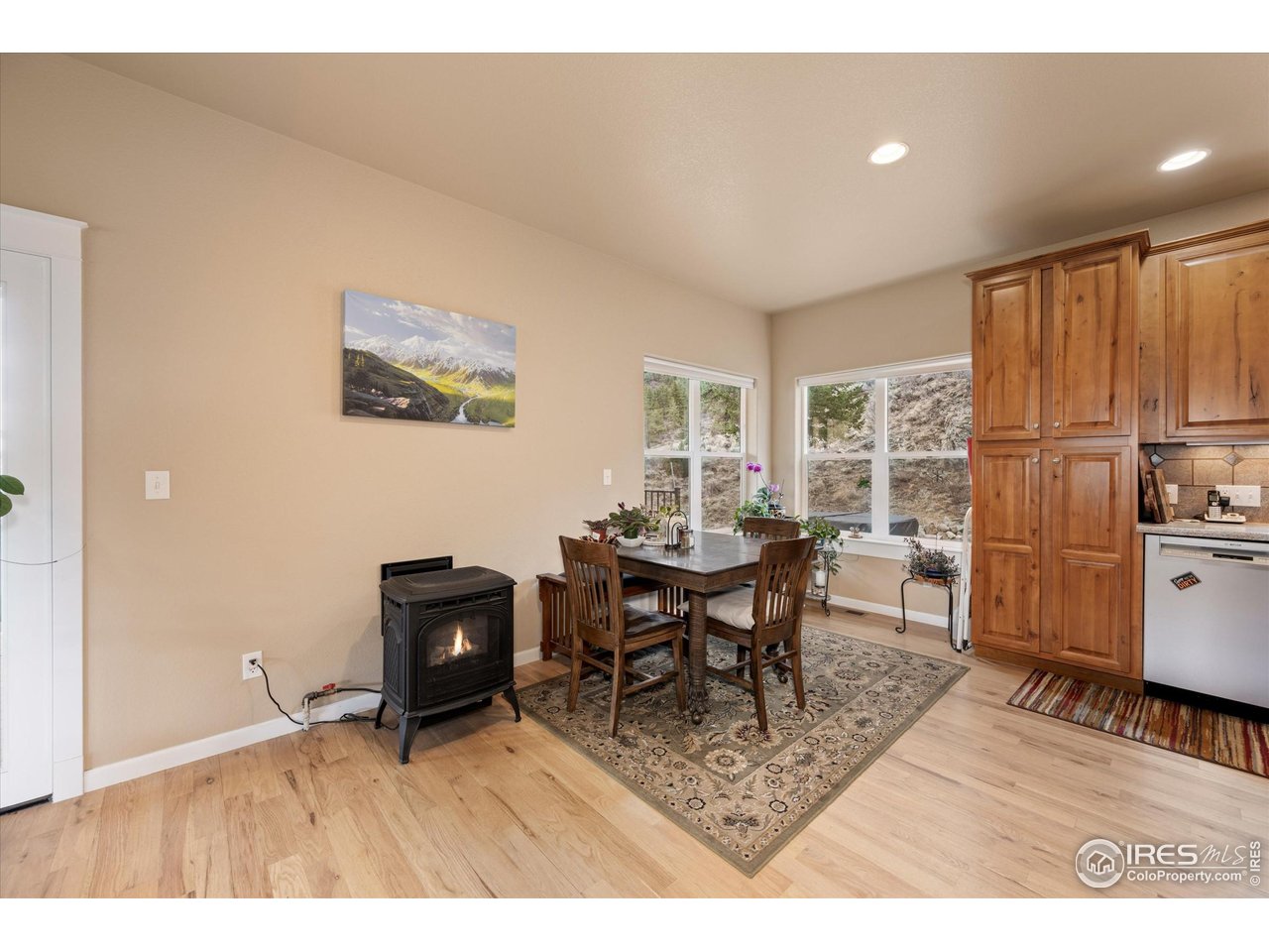 229 Rustic Road Bellvue, CO 80512 - Photo 20 of 50 a workspace with furniture window and wooden floor
