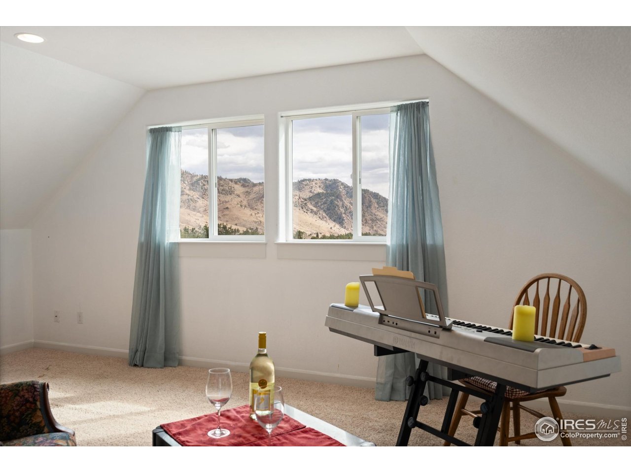 229 Rustic Road Bellvue, CO 80512 - Photo 37 of 50 a workspace with furniture and window