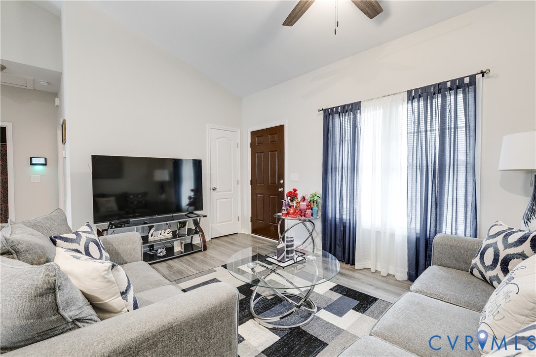 10525 Amelia Springs Road Jetersville, VA 23083 - Photo 20 of 25 a living room with furniture and a flat screen tv