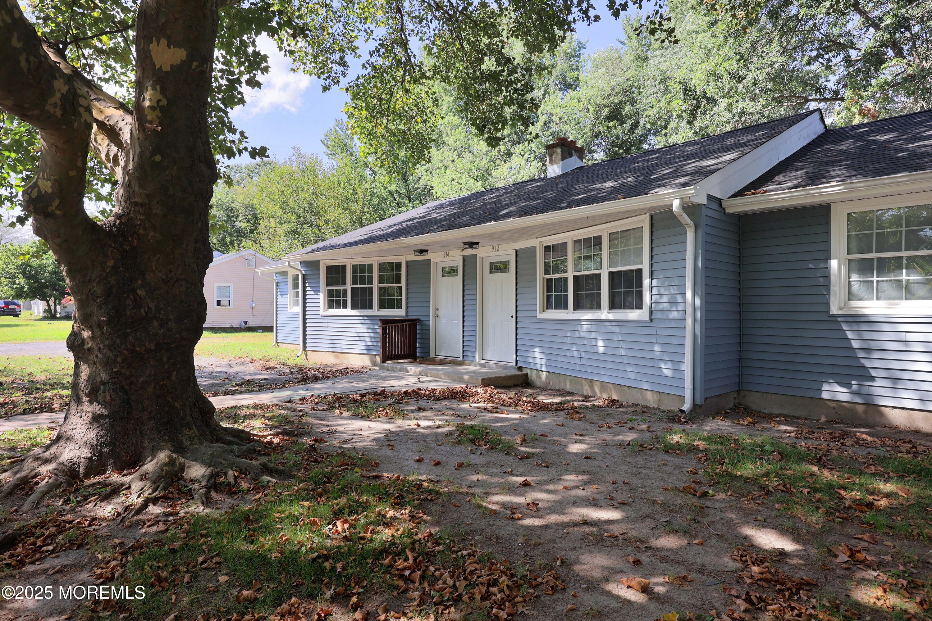 912 Pemberton Browns Mills Road Pemberton, NJ 08068 - Photo 16 of 28 a view of house with backyard and a tree