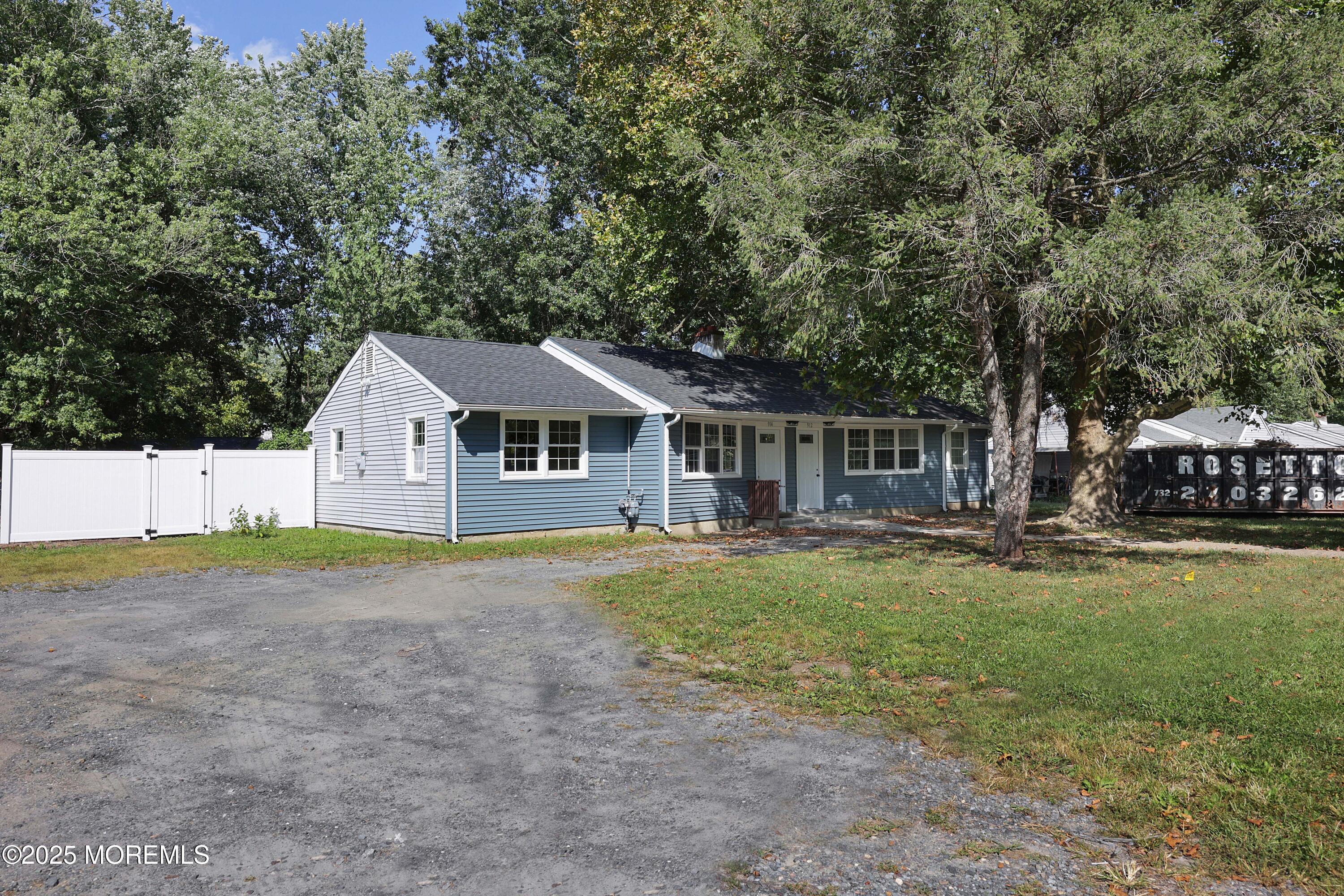 912 Pemberton Browns Mills Road Pemberton, NJ 08068 - Photo 22 of 28 a front view of a house with garden