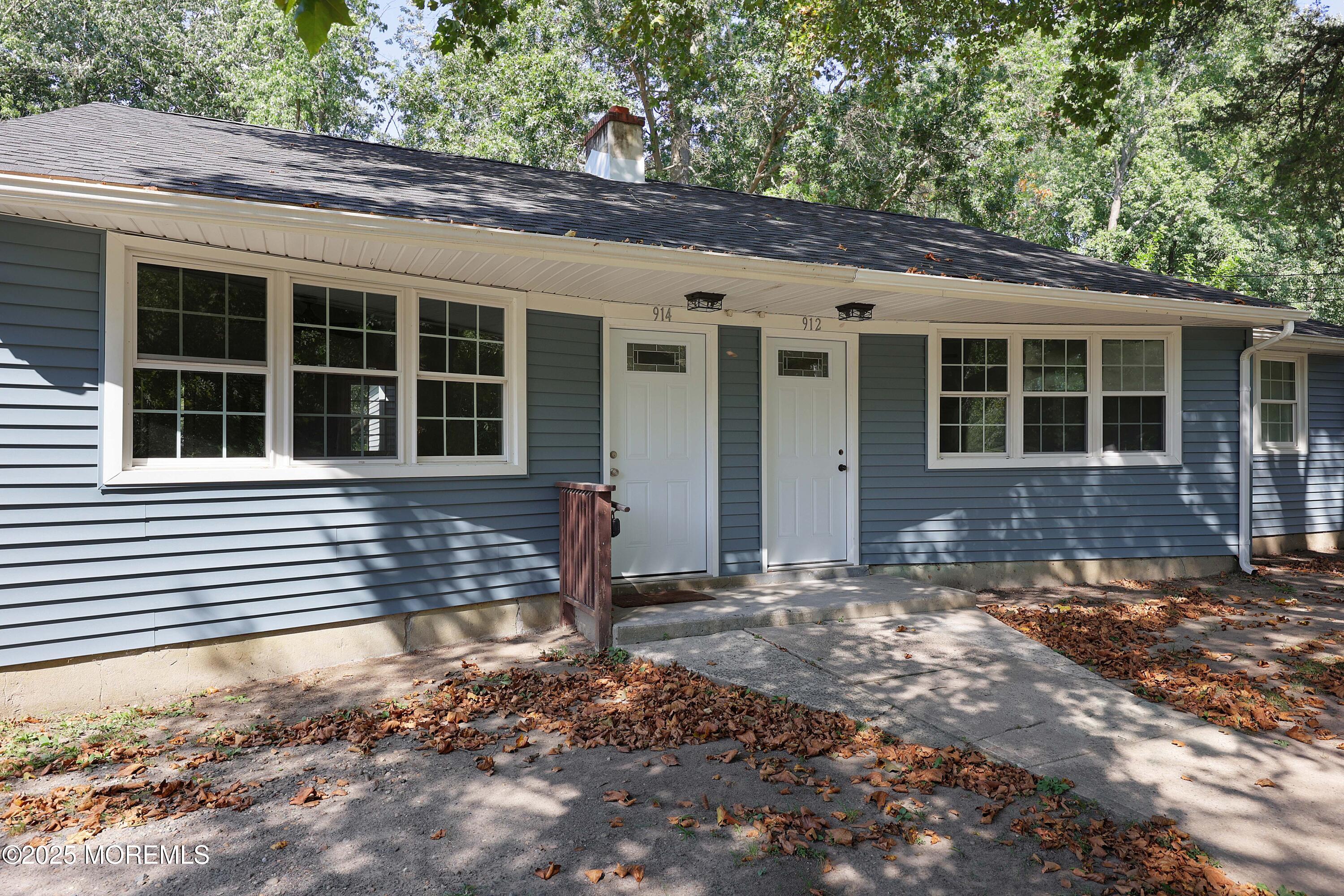 912 Pemberton Browns Mills Road Pemberton, NJ 08068 - Photo 25 of 28 a front view of a house with a yard