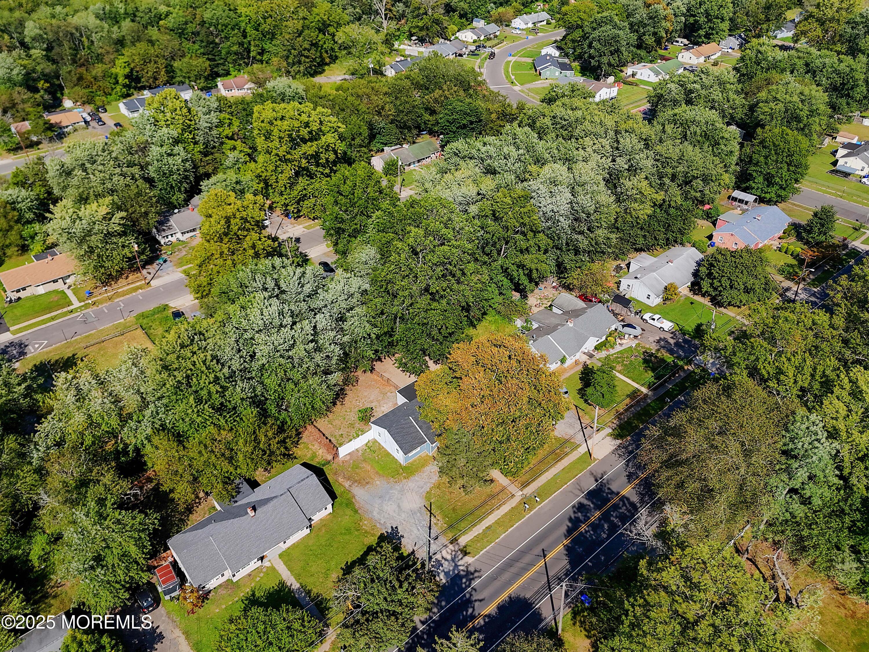 912 Pemberton Browns Mills Road Pemberton, NJ 08068 - Photo 26 of 28 an aerial view of a house with a yard
