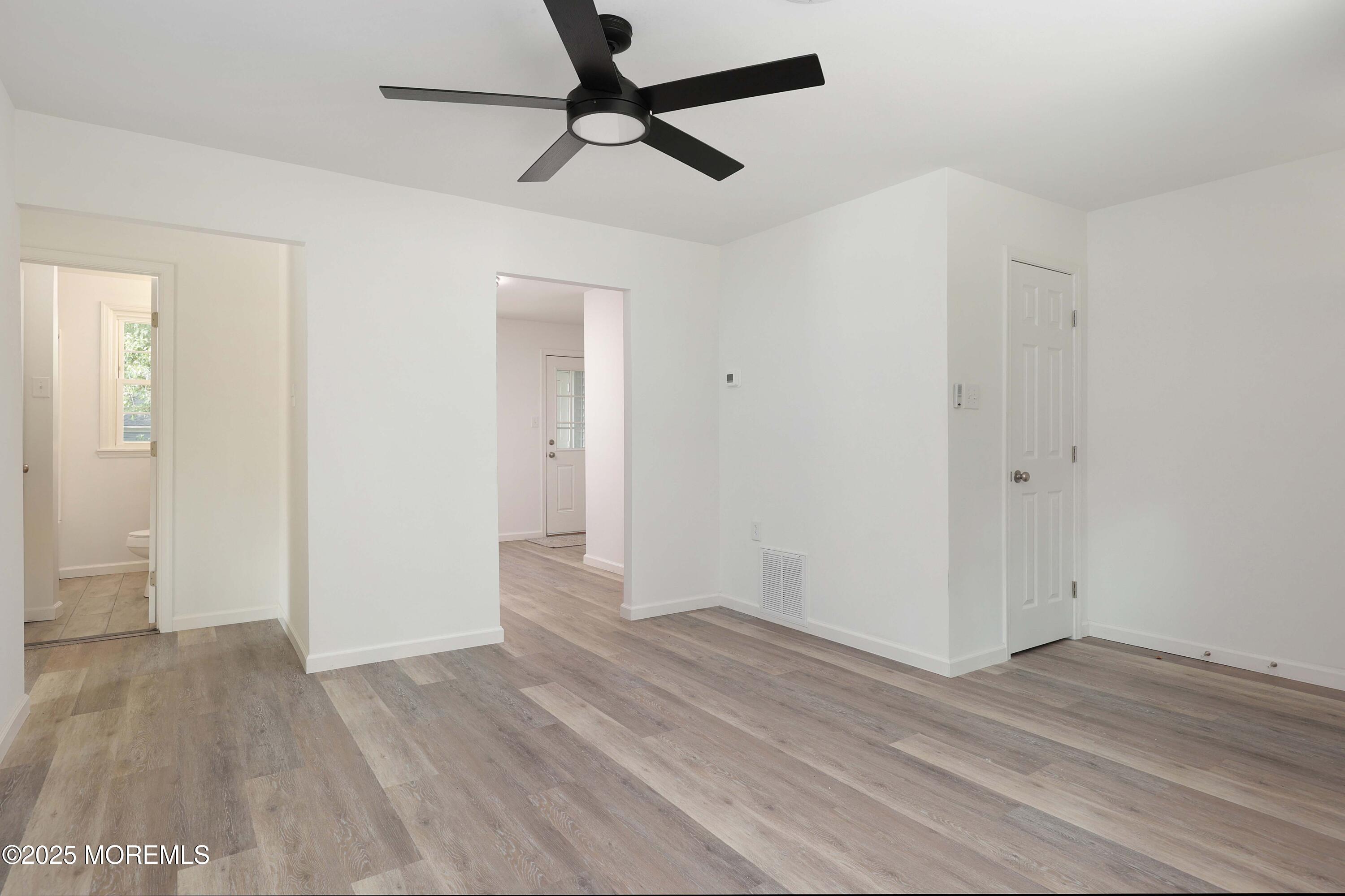 912 Pemberton Browns Mills Road Pemberton, NJ 08068 - Photo 7 of 28 wooden floor in an empty room