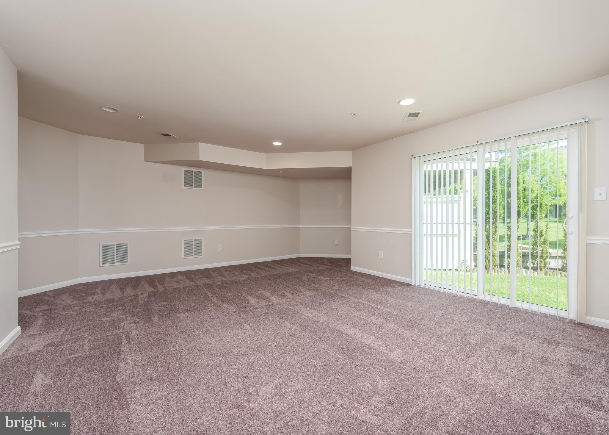 9830 Garden Ranges Laurel, MD 20723 - Photo 11 of 34 a view of an empty room with a window