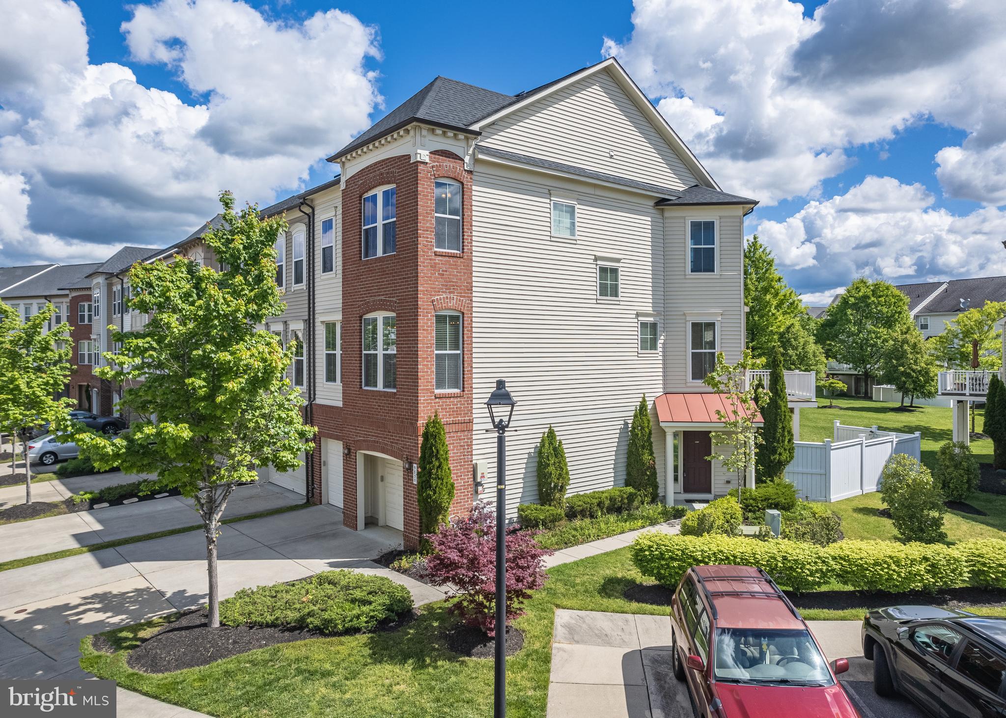 9830 Garden Ranges Laurel, MD 20723 - Photo 16 of 34 a front view of a house with a yard