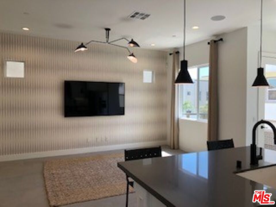527 Daniel Freeman Circle Inglewood, CA 90301 - Photo 12 of 36 a kitchen with a table and chairs