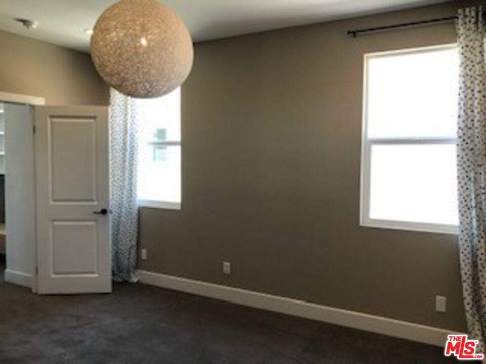 527 Daniel Freeman Circle Inglewood, CA 90301 - Photo 25 of 36 an empty room with a window