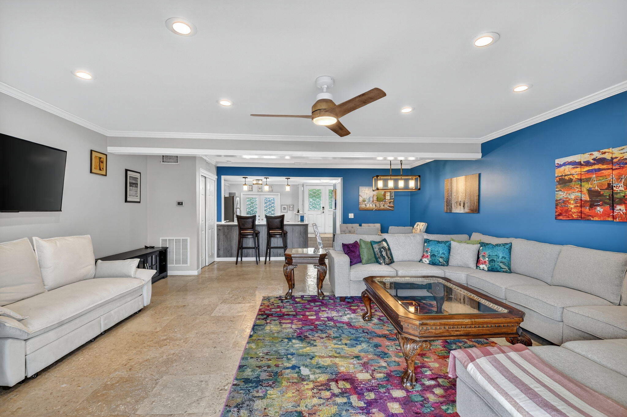 732 Rider Road Boynton Beach, FL 33435 - Photo 12 of 66 a living room with furniture and a flat screen tv