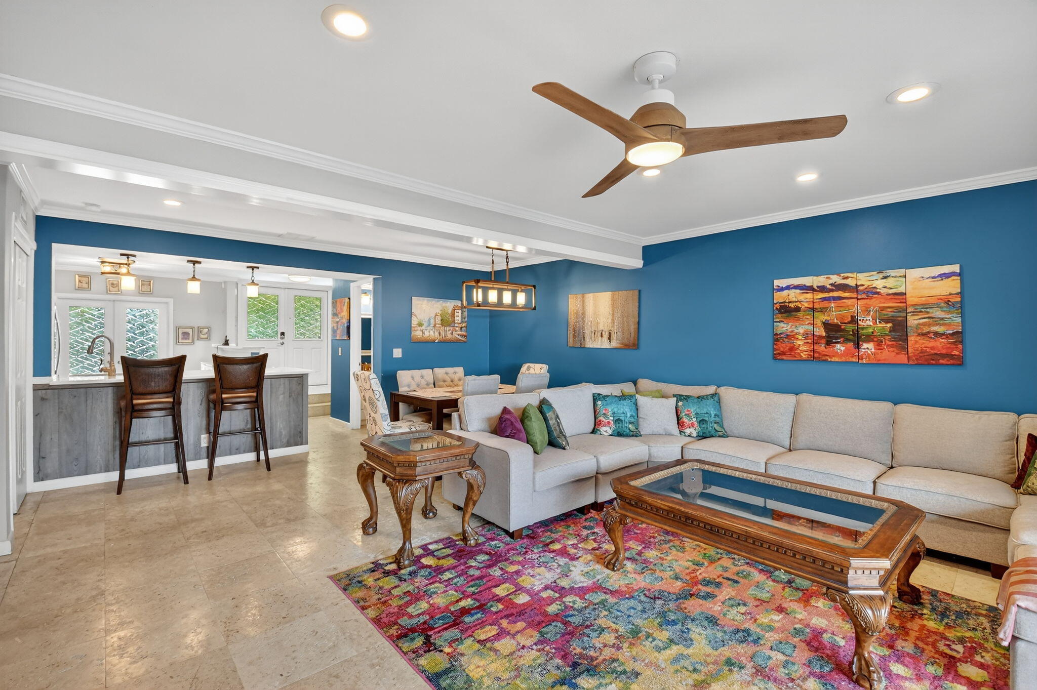 732 Rider Road Boynton Beach, FL 33435 - Photo 16 of 66 a living room with furniture a rug and a flat screen tv