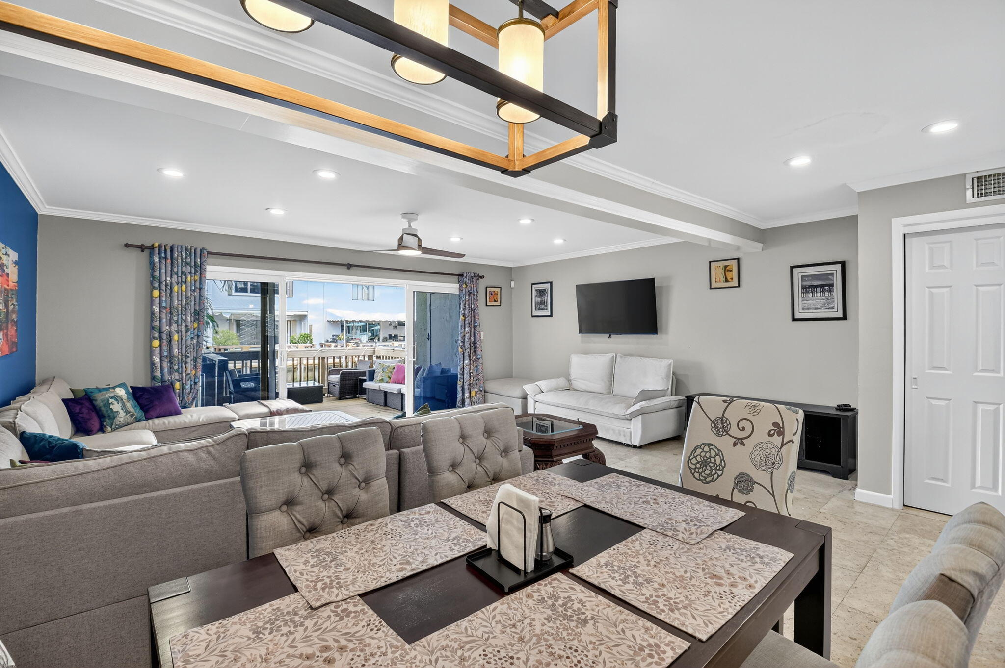 732 Rider Road Boynton Beach, FL 33435 - Photo 19 of 66 a living room with furniture and a flat screen tv