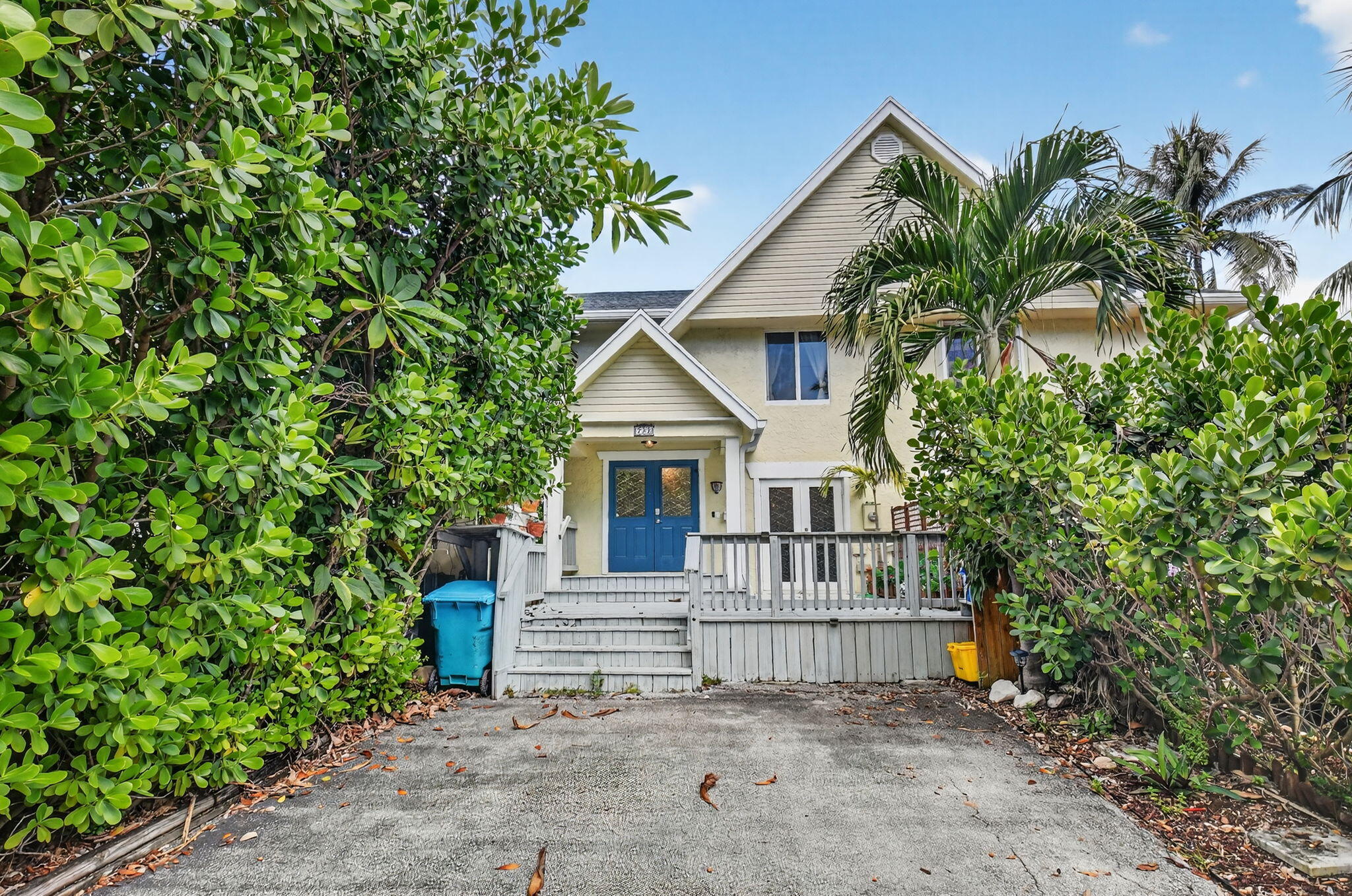 732 Rider Road Boynton Beach, FL 33435 - Photo 2 of 66 a view of a house with a small yard and plants