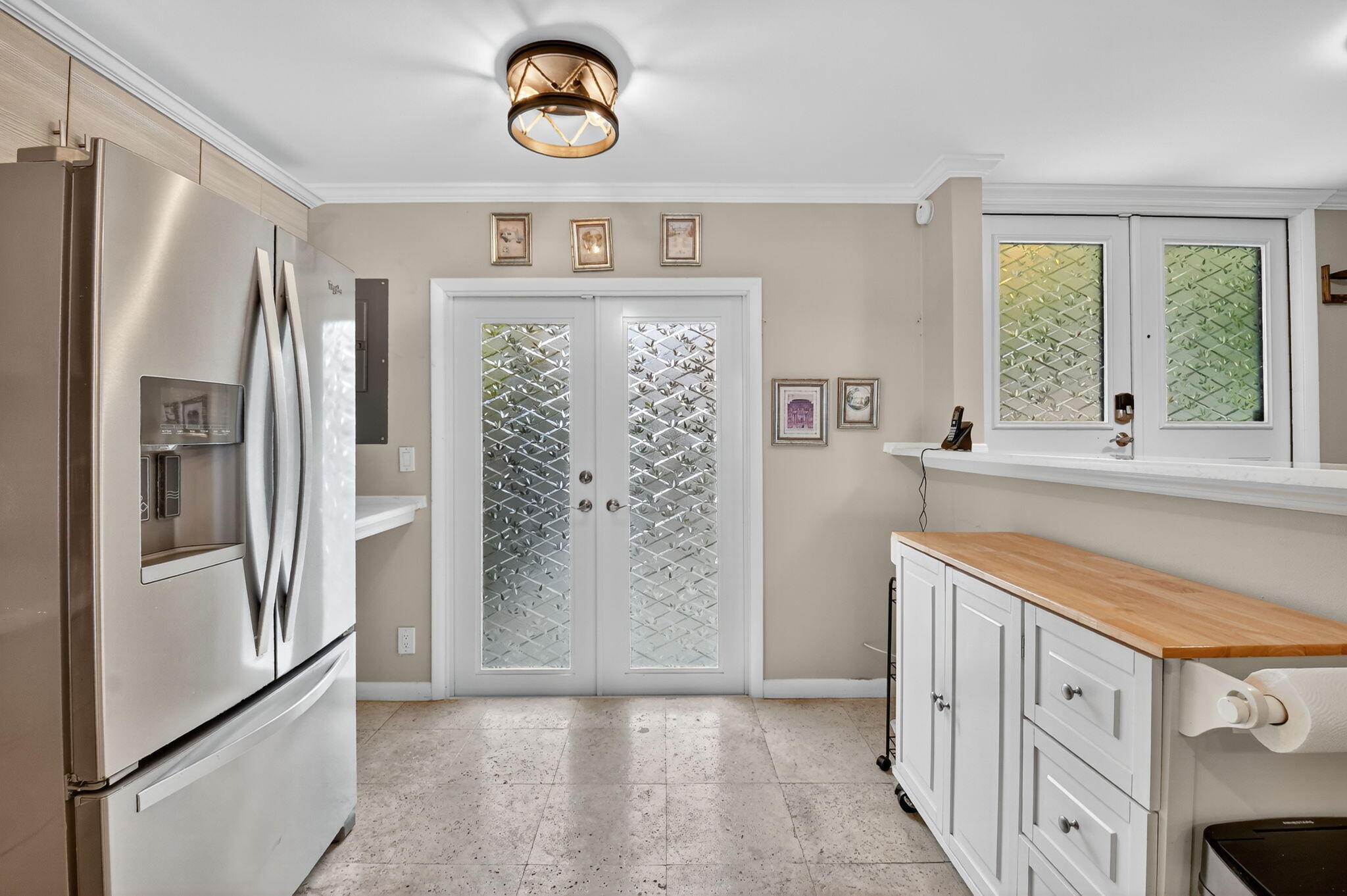 732 Rider Road Boynton Beach, FL 33435 - Photo 24 of 66 a kitchen with stainless steel appliances granite countertop a refrigerator and a sink