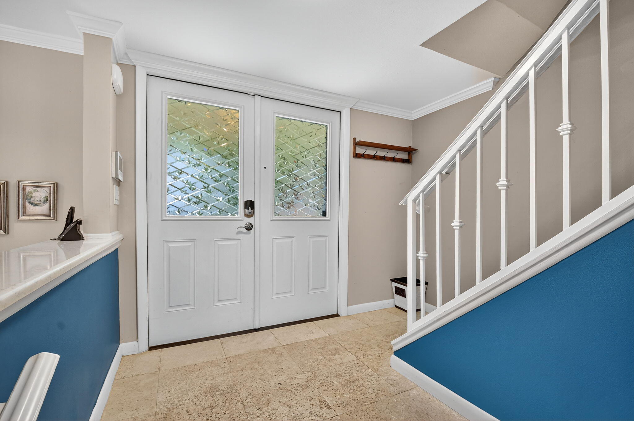 732 Rider Road Boynton Beach, FL 33435 - Photo 27 of 66 a view of a hallway to a bedroom with wooden floor and stairs