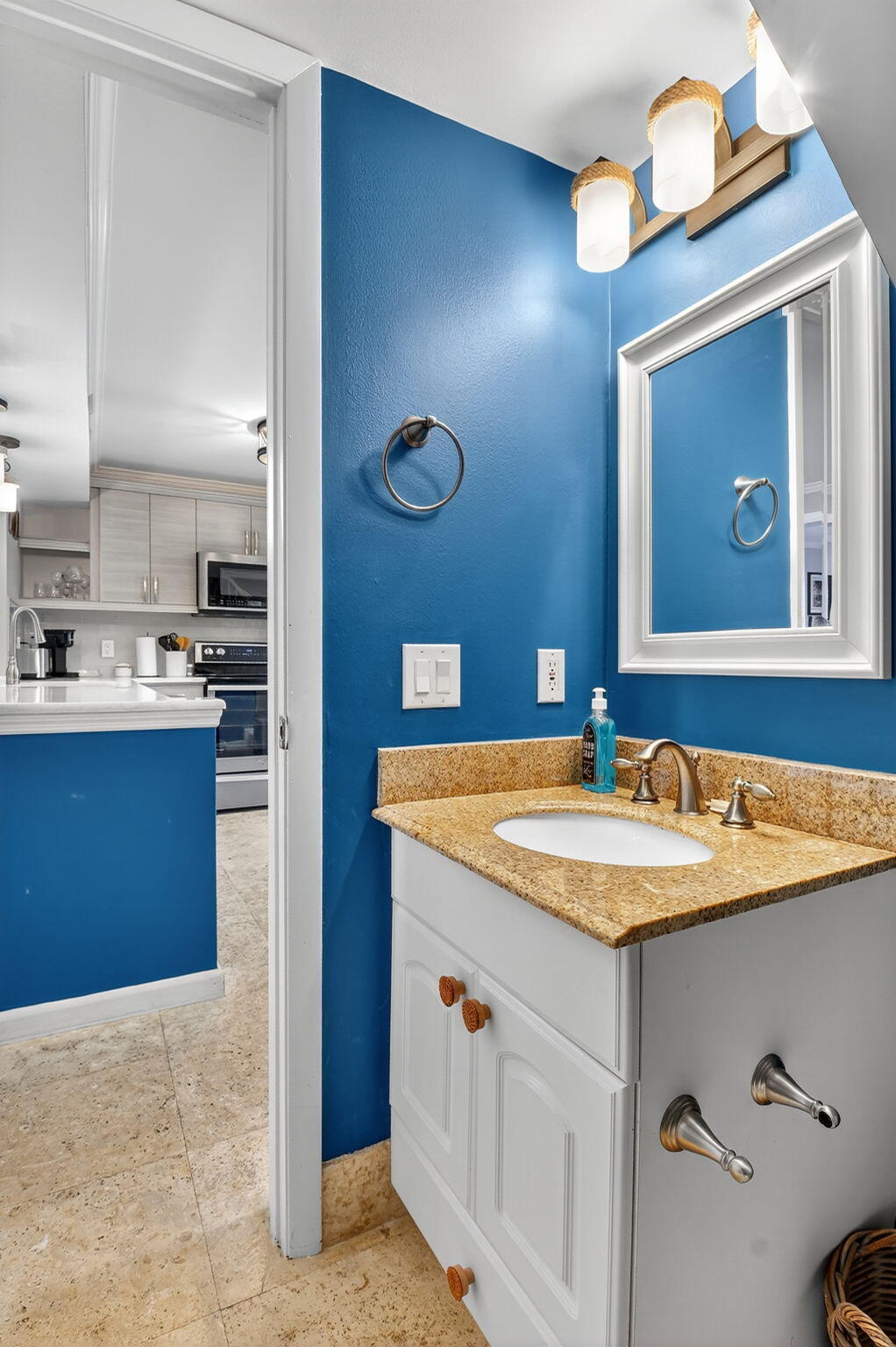 732 Rider Road Boynton Beach, FL 33435 - Photo 29 of 66 a bathroom with a sink vanity and mirror