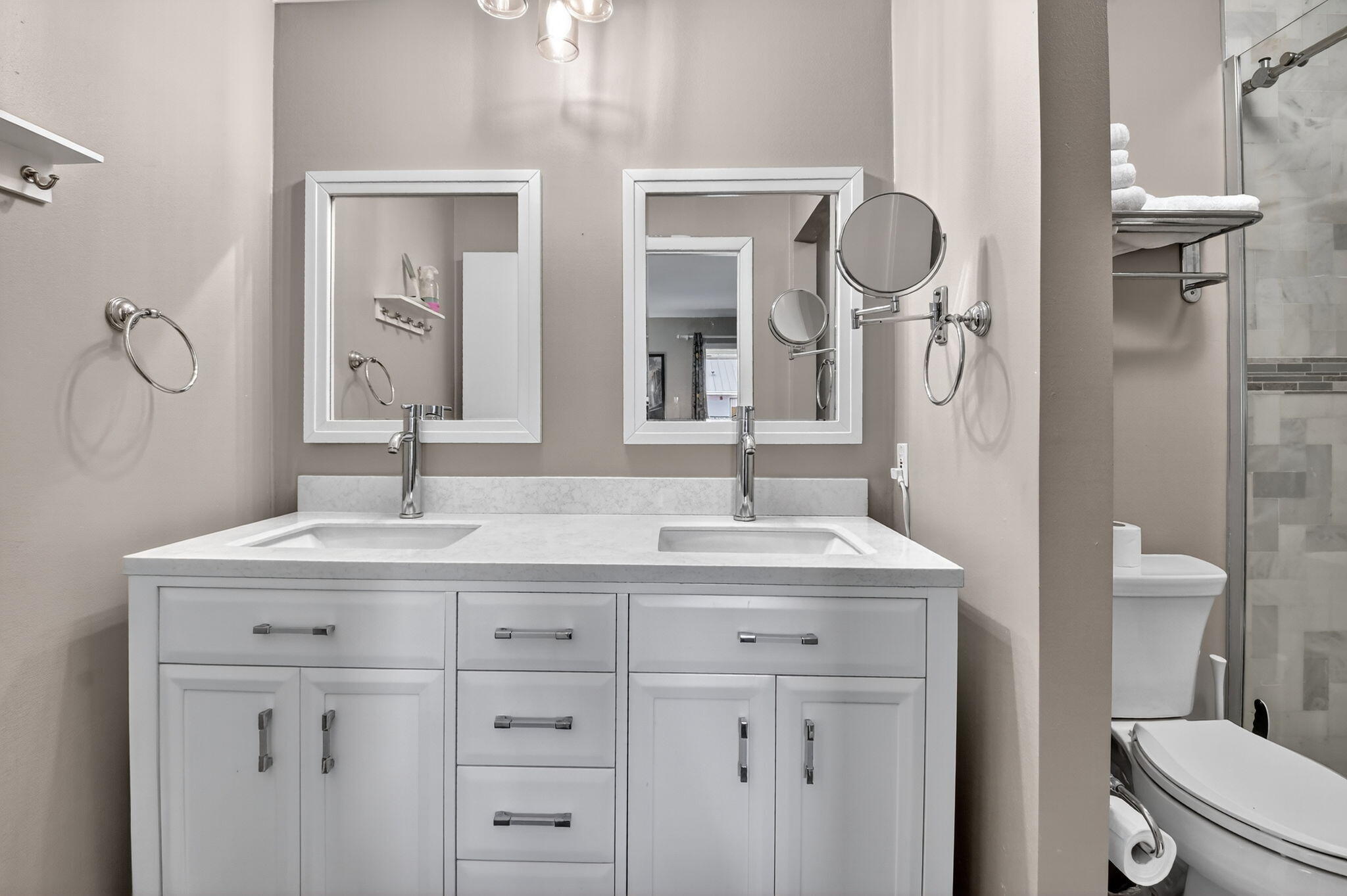 732 Rider Road Boynton Beach, FL 33435 - Photo 37 of 66 a bathroom with a granite countertop sink a toilet and a mirror